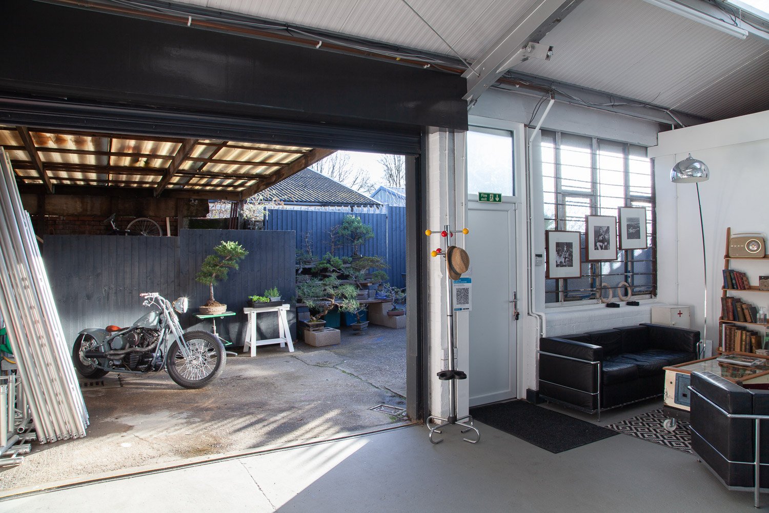 Photographic studio with large roller door opening onto a yard, suited to car and motorbike shoots, interior design photographer, Essex
