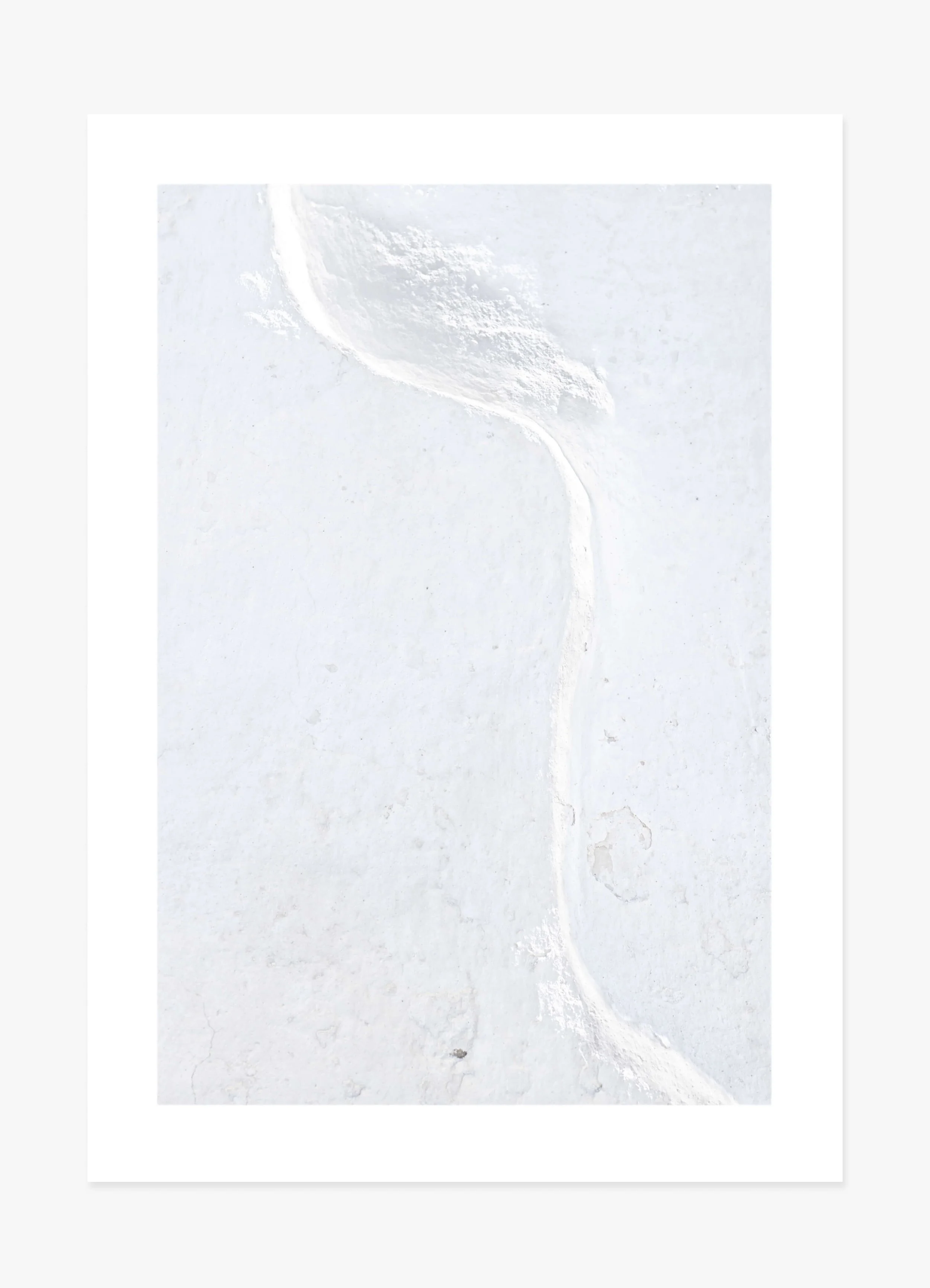 Fineart photography print of lose-up art of a white wall revealing subtle texture and crevice details