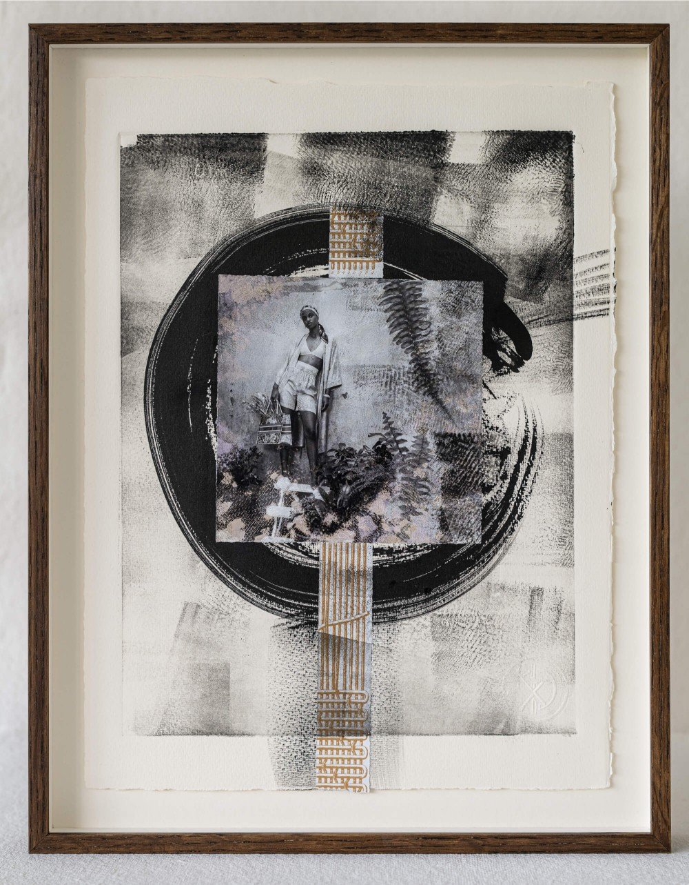 Framed monoprint showcasing a woman's image with abstract elements