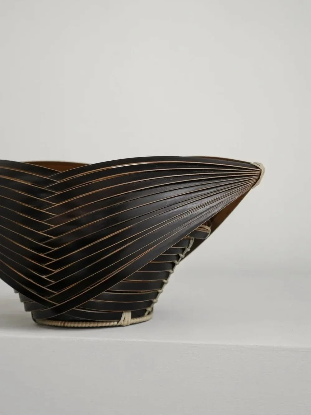 Now sold - Japanese sculptural woven ikebana basket. Hand-crafted from fine bamboo strips with a black urushi lacquer finish and Kenzan for stems. Shōwa era