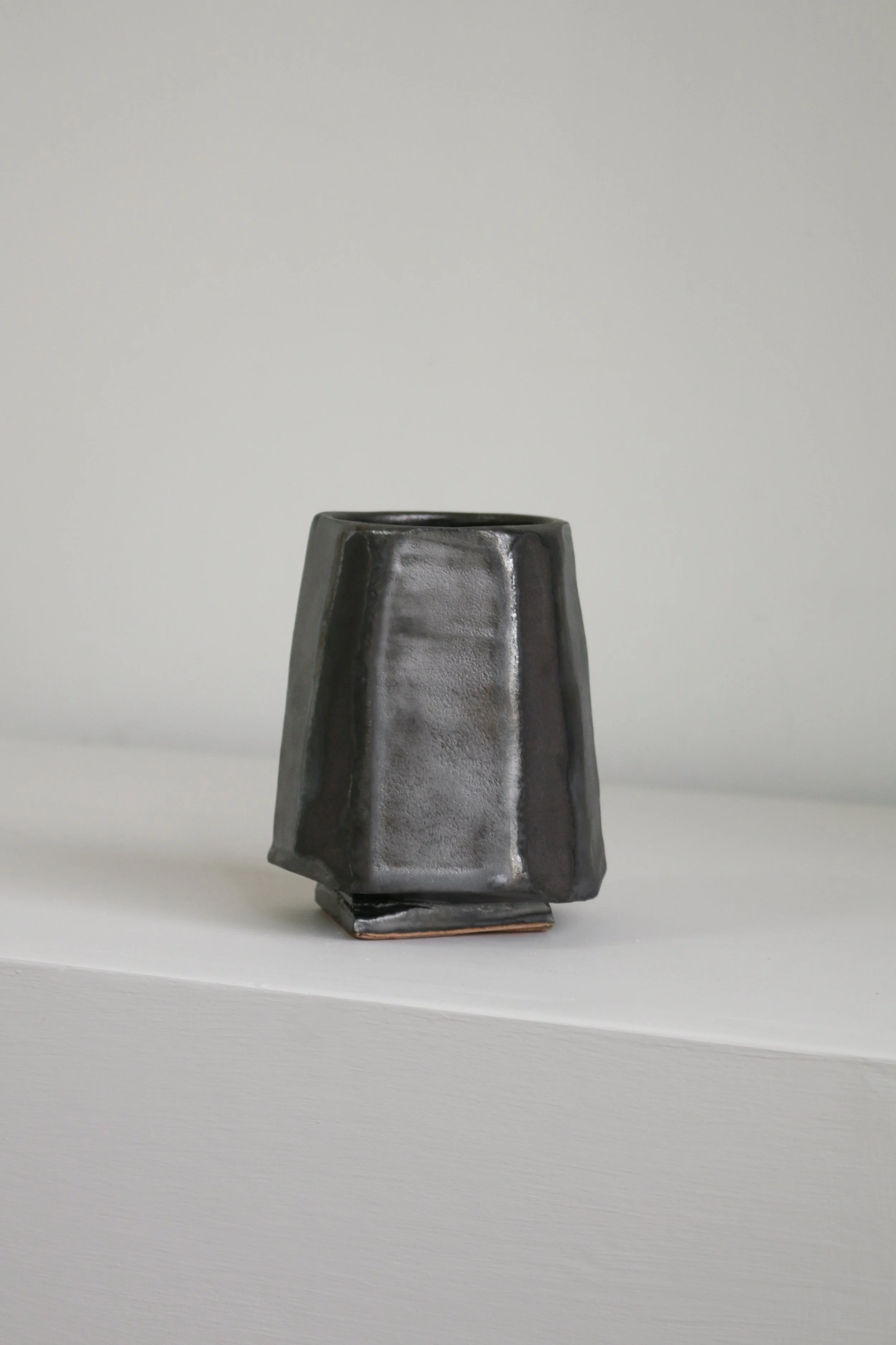 Cut sided gunmental pewter cup vessel-1.jpg