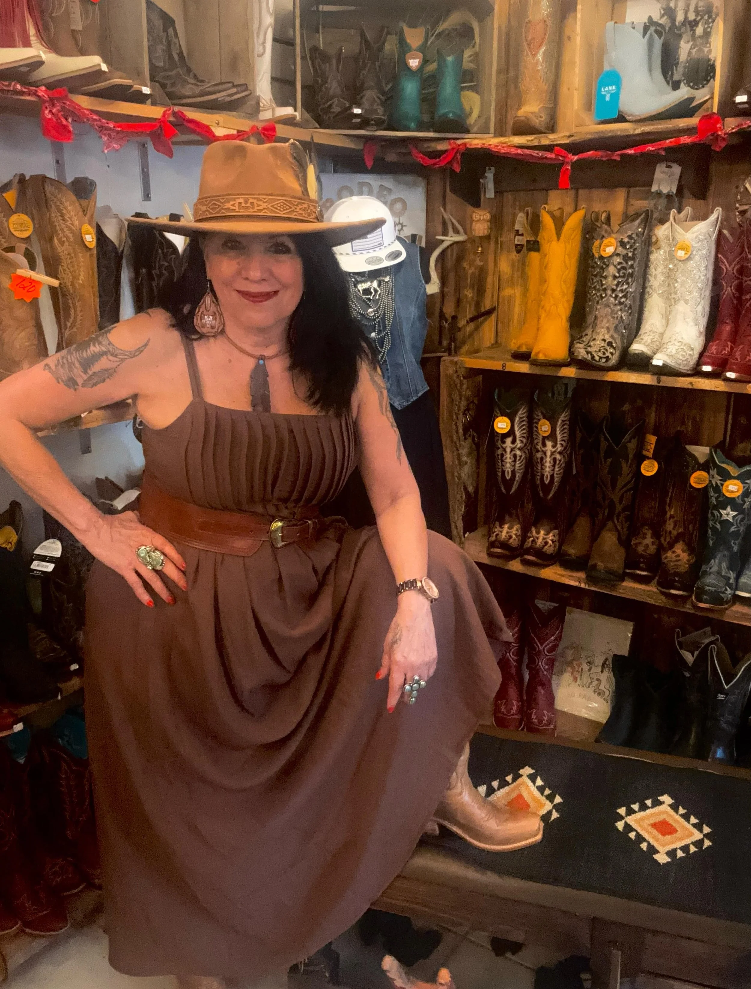 Summertime dresses are my favorite.  Hyer boots for that casual comfort and top off the look with a custom hat by Emily!  #summervibes  #cowboysandangels  #mainstreet