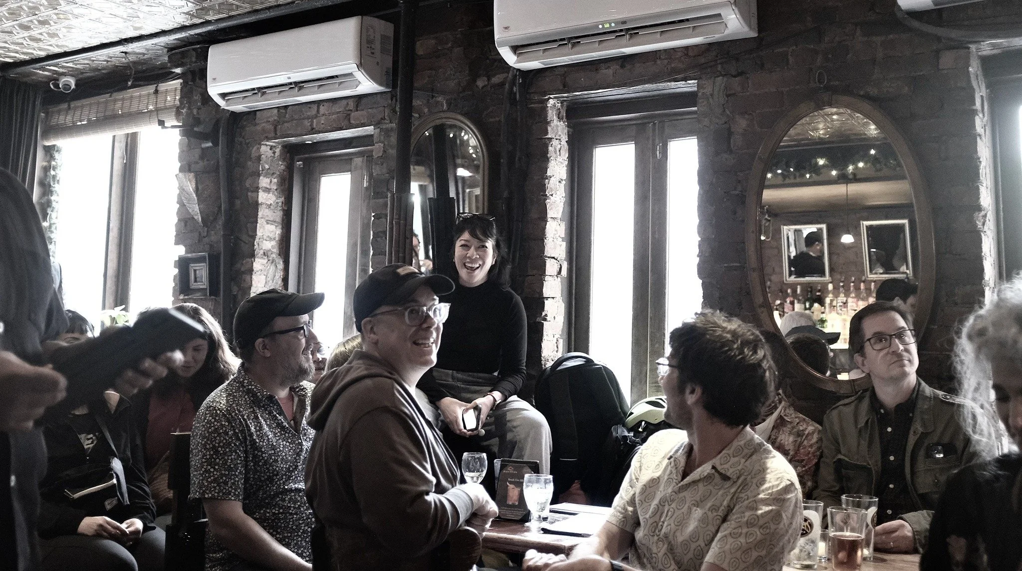 Author K.T. Nguyen in crowded bar