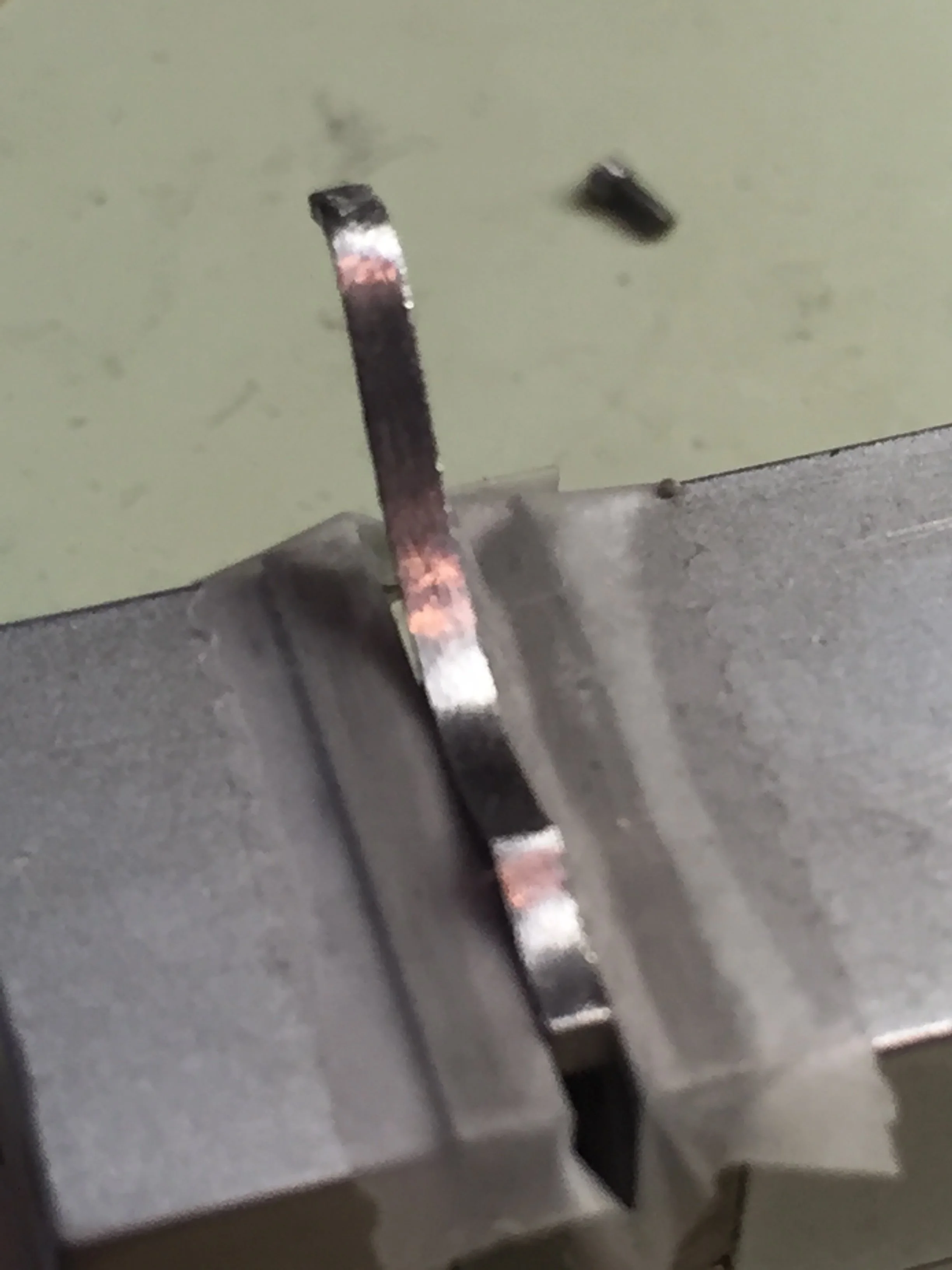 Chronograph spring filing and line finishing part