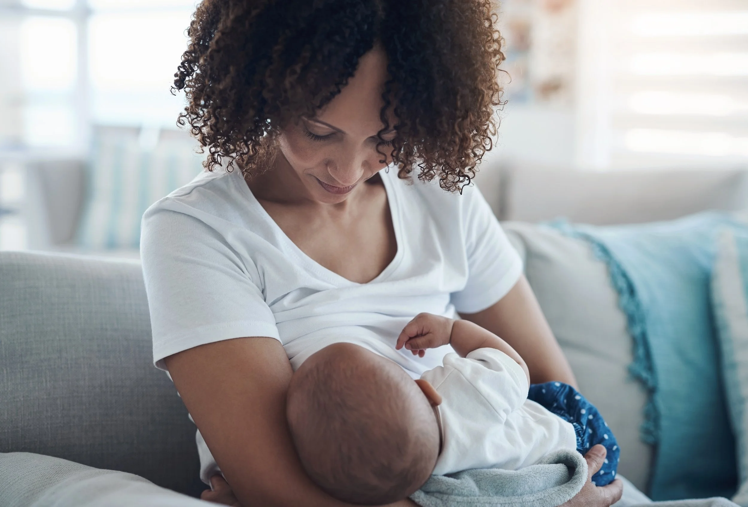 Black woman breastfeeding in Northern, VA and Washington DC metro area.