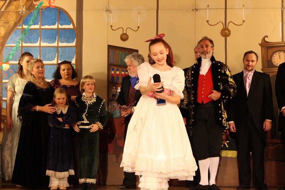 Clara dances with the Nutcracker during the party scene.