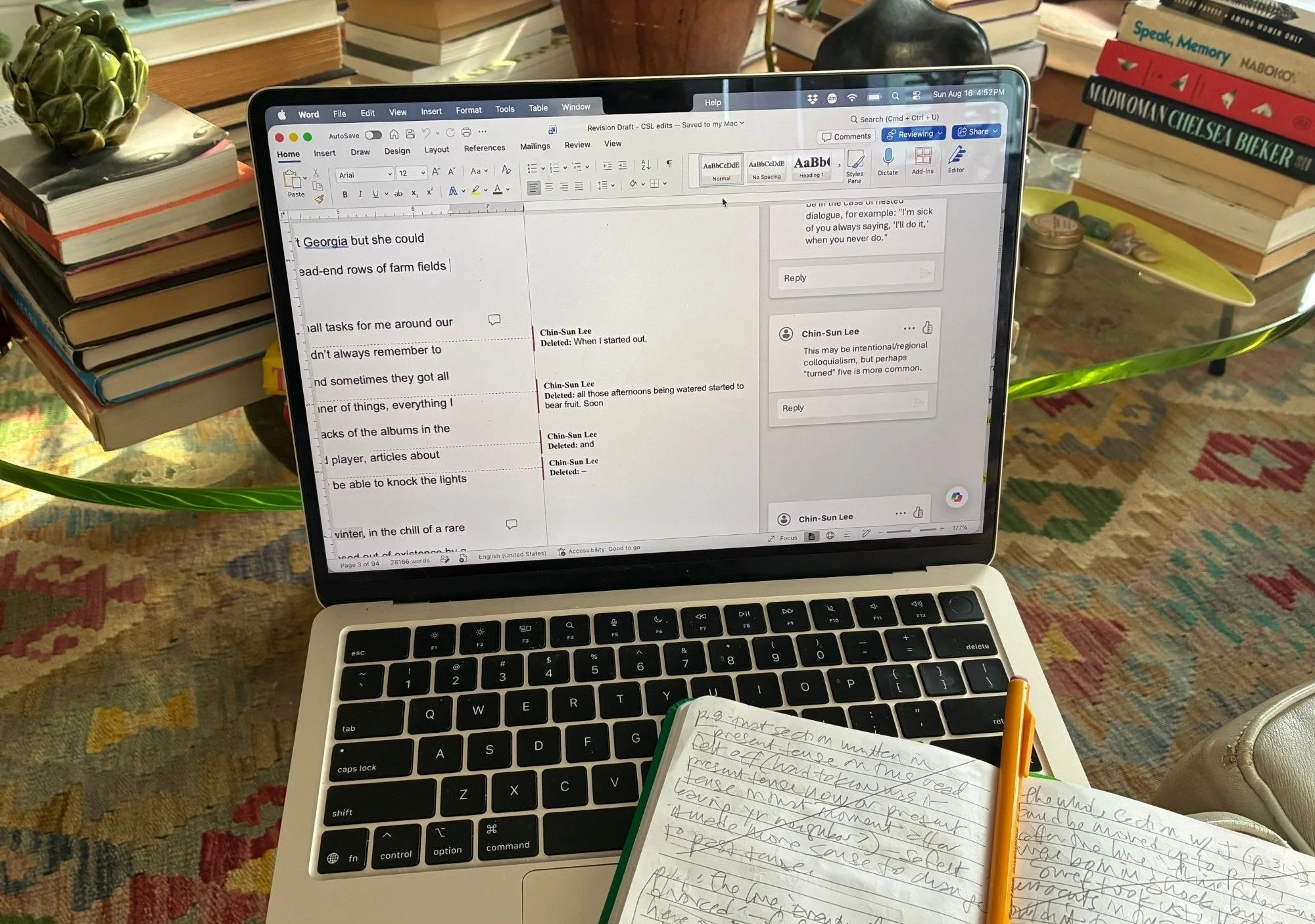Chin-Sun Lee's laptop displaying an editorial document as she works.