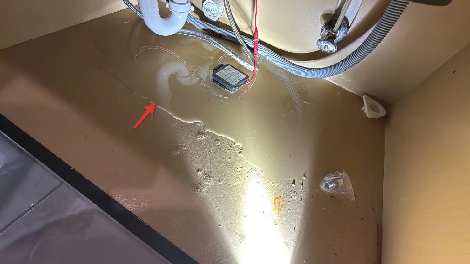 Kitchen Sink Leak From a Misinstalled Dishwasher Air Gap