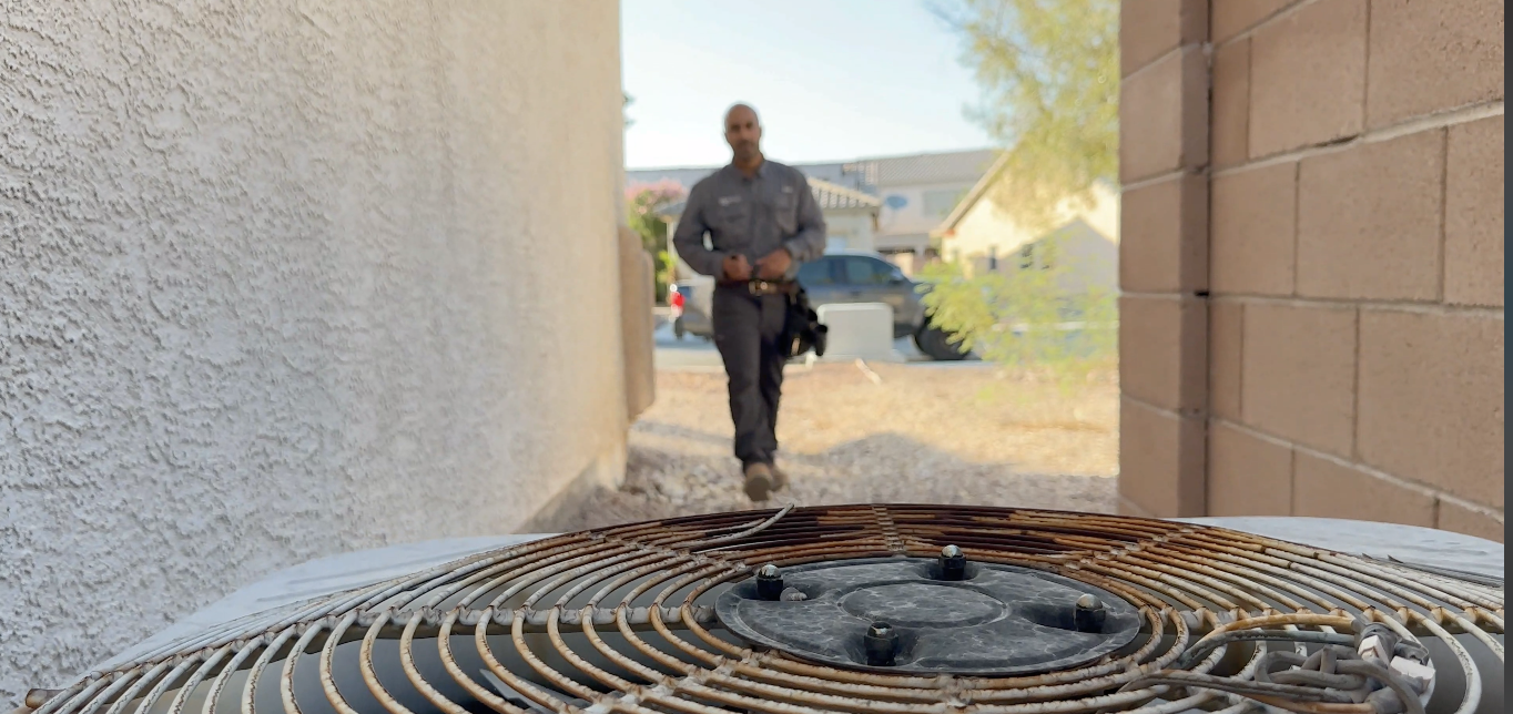 Las Vegas Home Inspector approaching outdoor air conditioning unit for Inspection.
