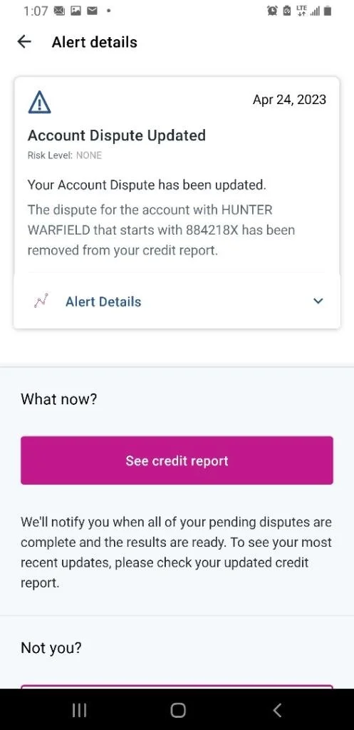 Mobile app screen showing an alert about accounting dispute update, dated April 24, 2023. It indicates the dispute for an account with Hunter Warfield starting with 884218X has been removed from the credit report. There's a button labeled 'See credit report' for more details.