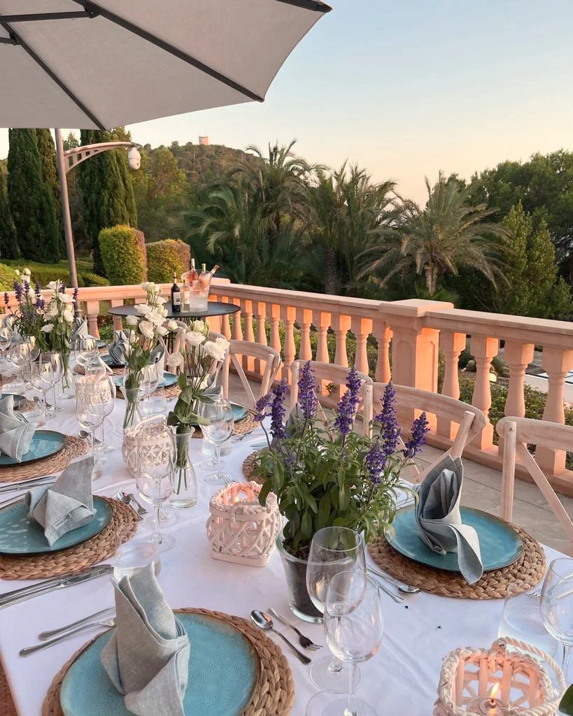 Private chef dinner table setup with flowers in Camp de Mar Mallorcan villa