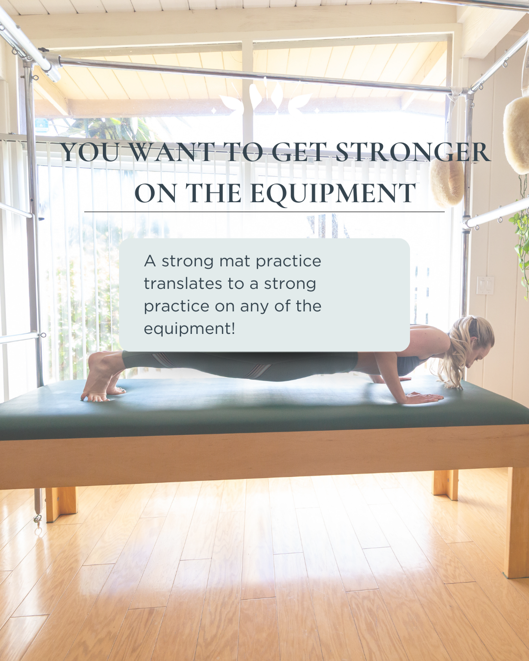 A woman does a push up on a Pilates Cadillac.