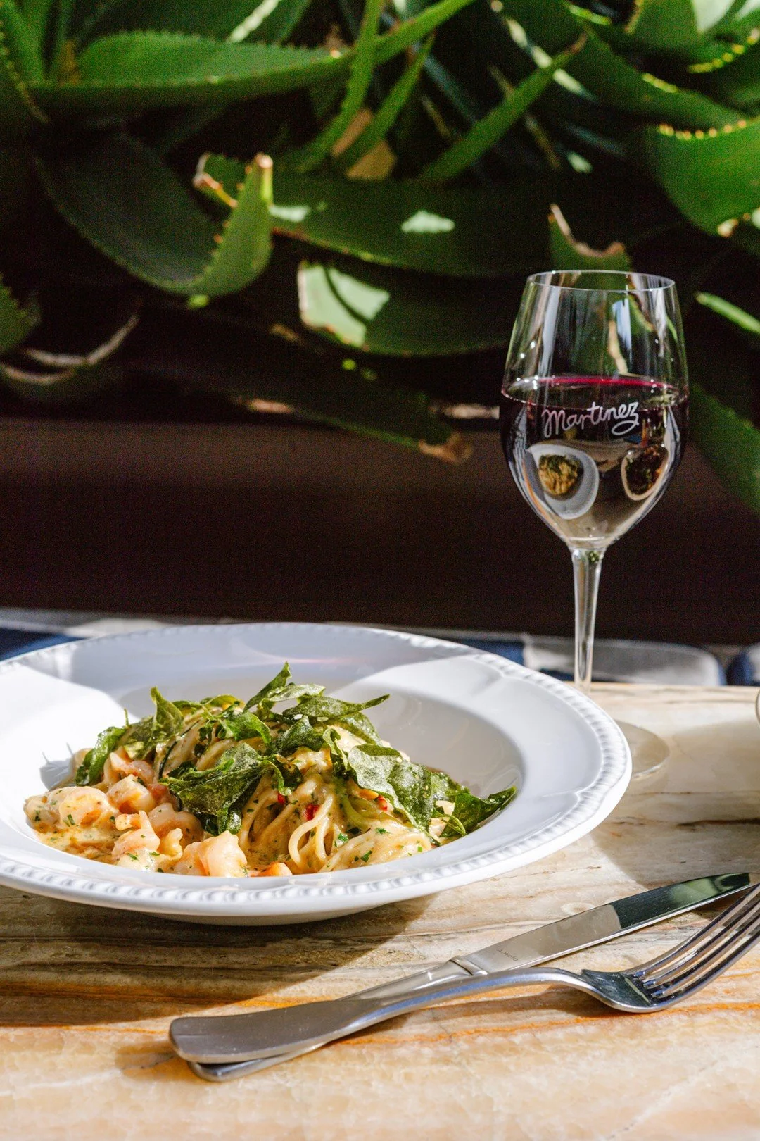 It's fresh and it's exactly what you&rsquo;re craving.

Spaghetti, king prawns, and a glass of red to go with.