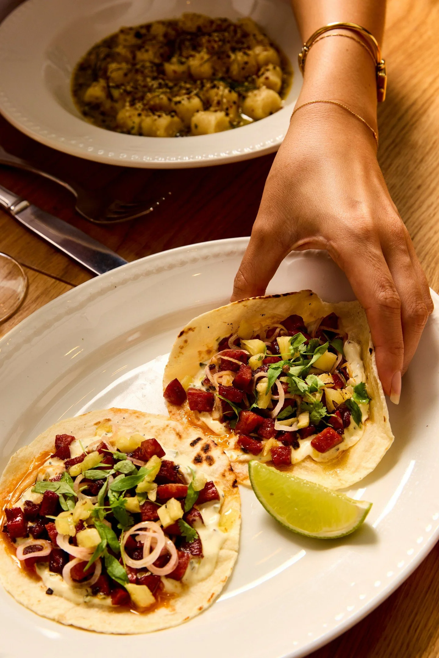 New to the menu. Chorizo, pickled red onion, roasted pineapple salsa, jalape&ntilde;o cream.