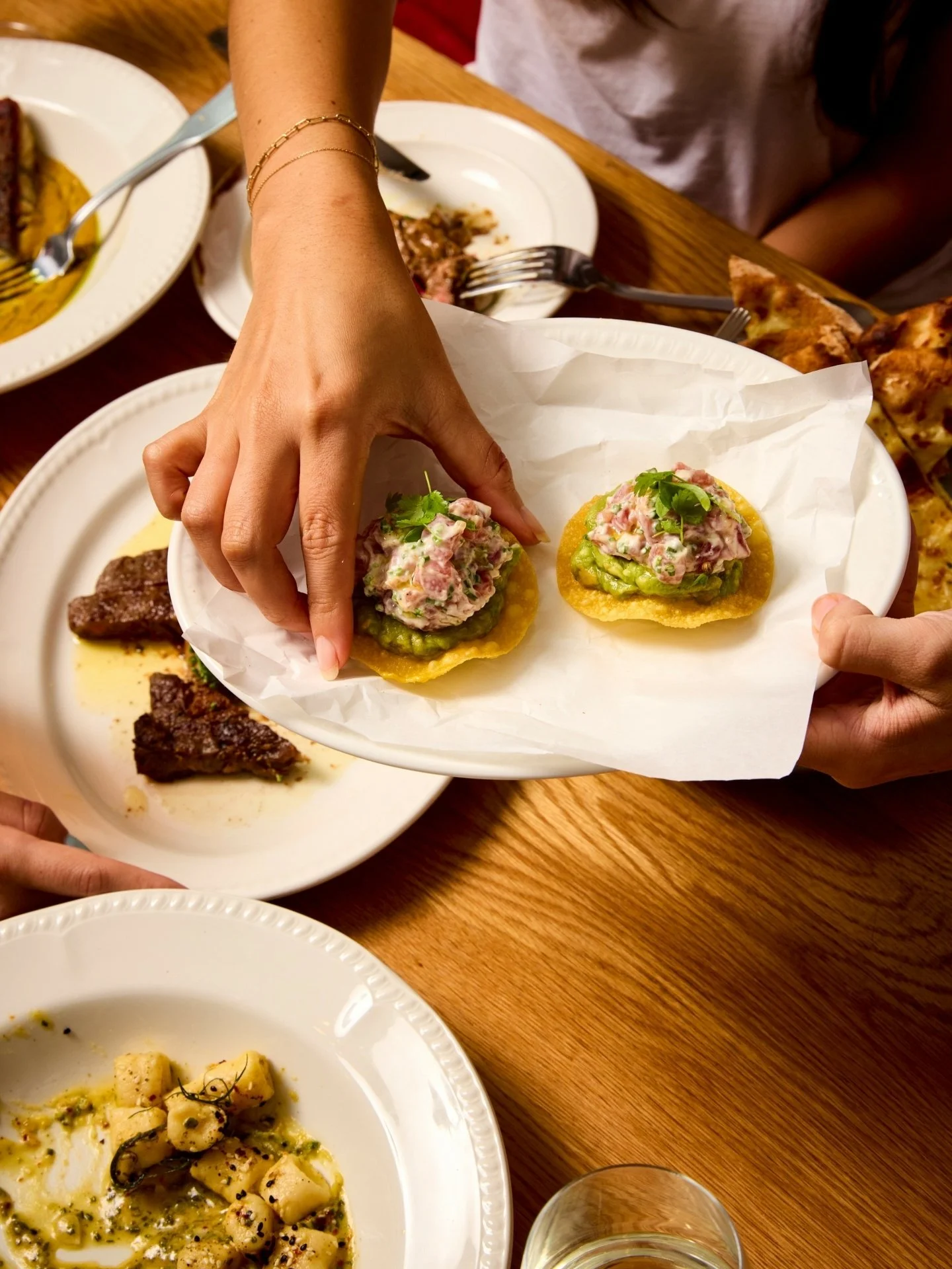 Raw tuna tostada with avocado, finger lime mayo. No one's waiting around.