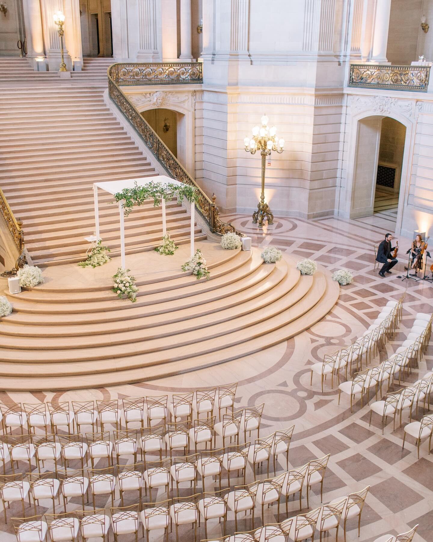 I spy with my little eye a string trio (minus the cello) in the midst of the dreamiest and most elegant wedding scene. 
.
.
Dream team: 
Planning &amp; Design: @daldevents, Photography: @theganeys, Venue: #sfcityhall, Floral design: @soulflowerdesign