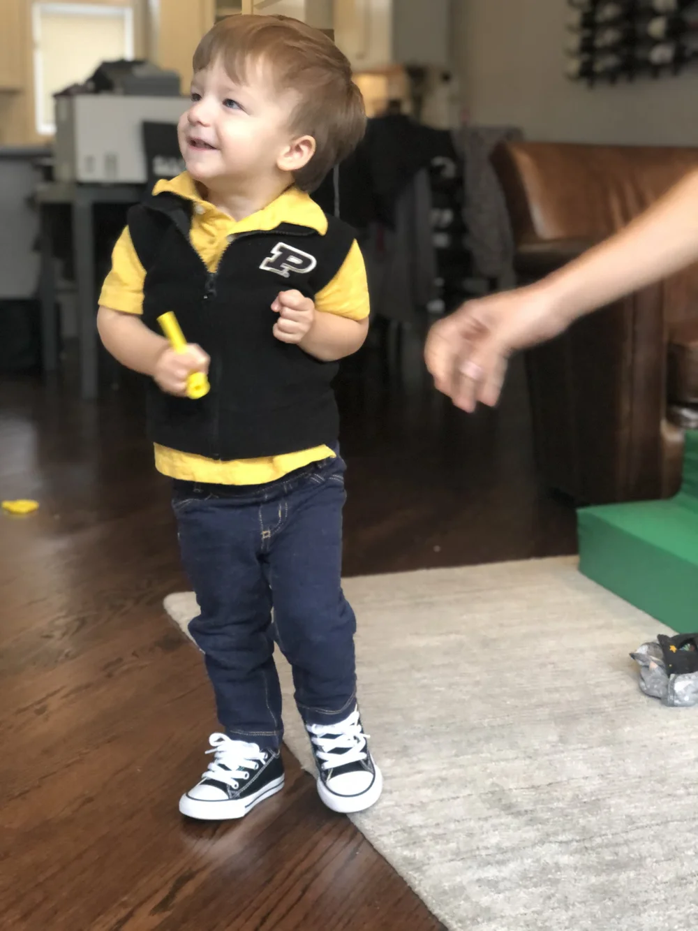 Young Boy Holding Chew Tube