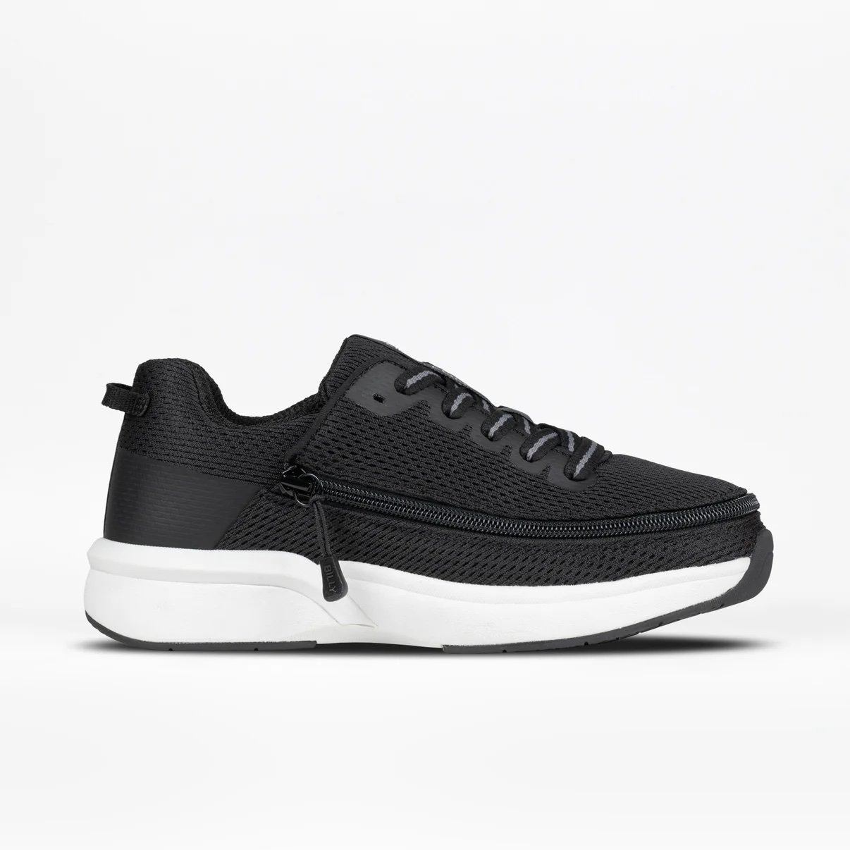 BILLY women's limitless shoe shown in black with a white rubber sole and a black full wrap zipper that