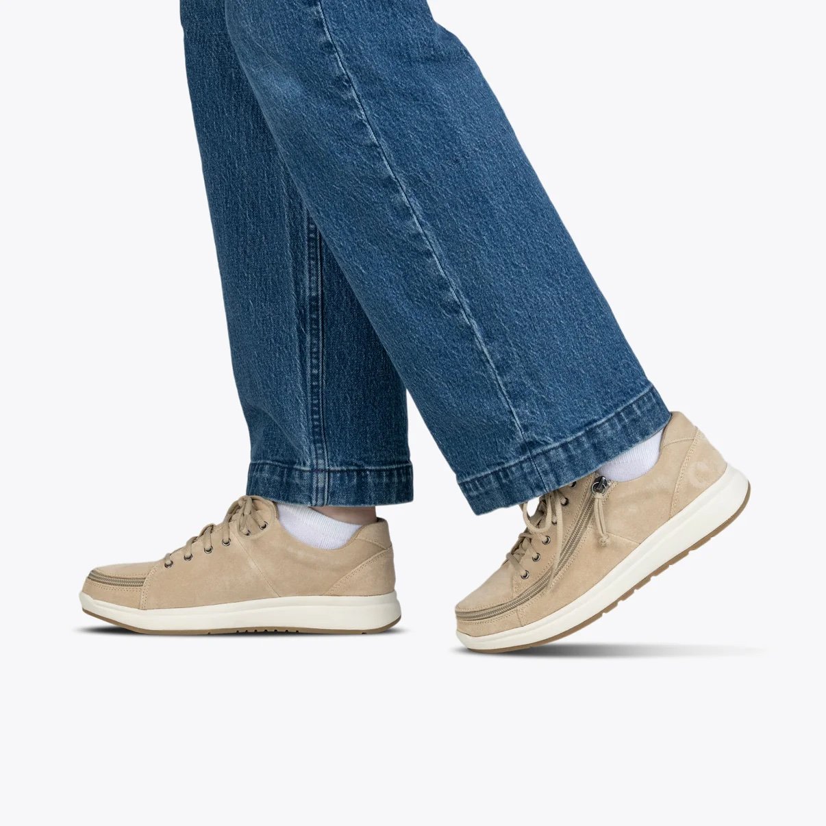 BILLY adaptive women's comfort low top shoe in tan suede on a woman wearing dark denim