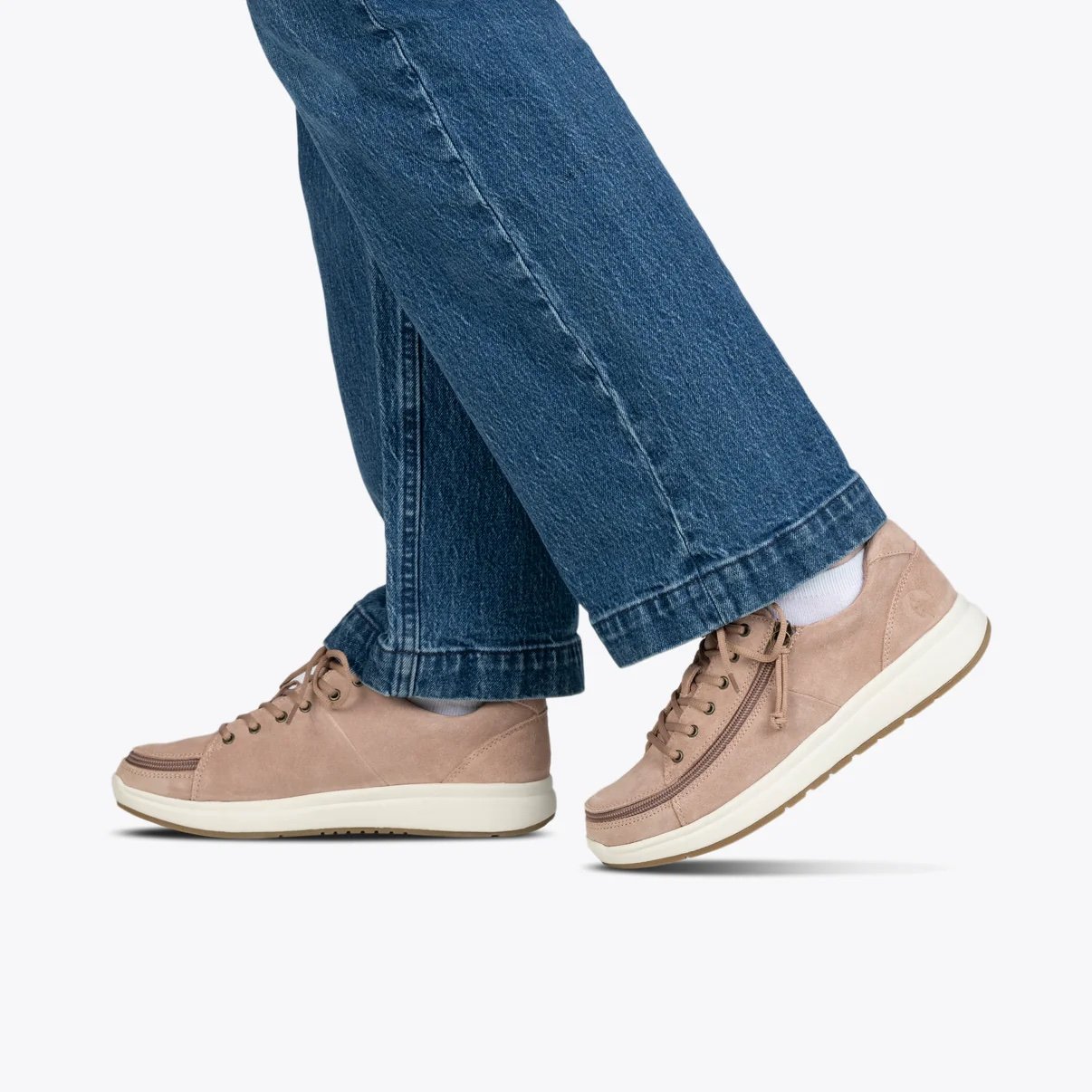 BILLY adaptive women's comfort low top shoe in blush suede on a woman wearing dark denim