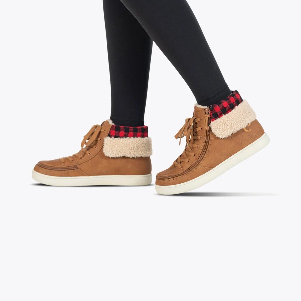 BILLY women's adaptive cognac high tops with a fur lined cuff with a red/black buffalo plaid highlight at the top shown on a women with black leggings