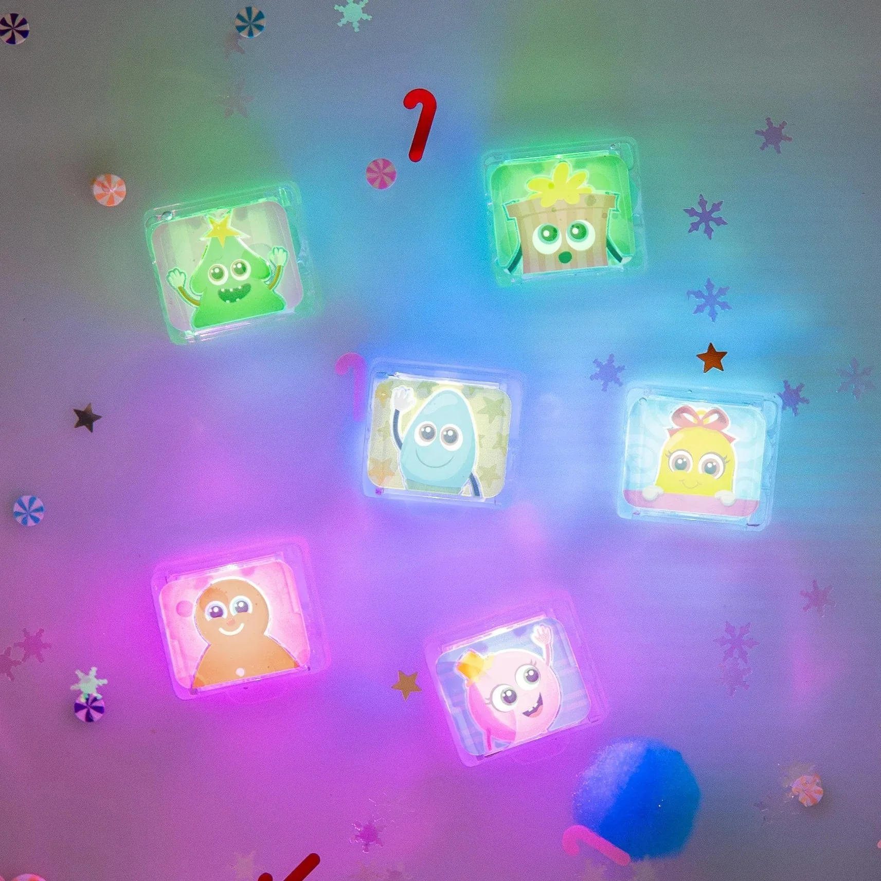 water with the light up glo pals shown illuminated in the water