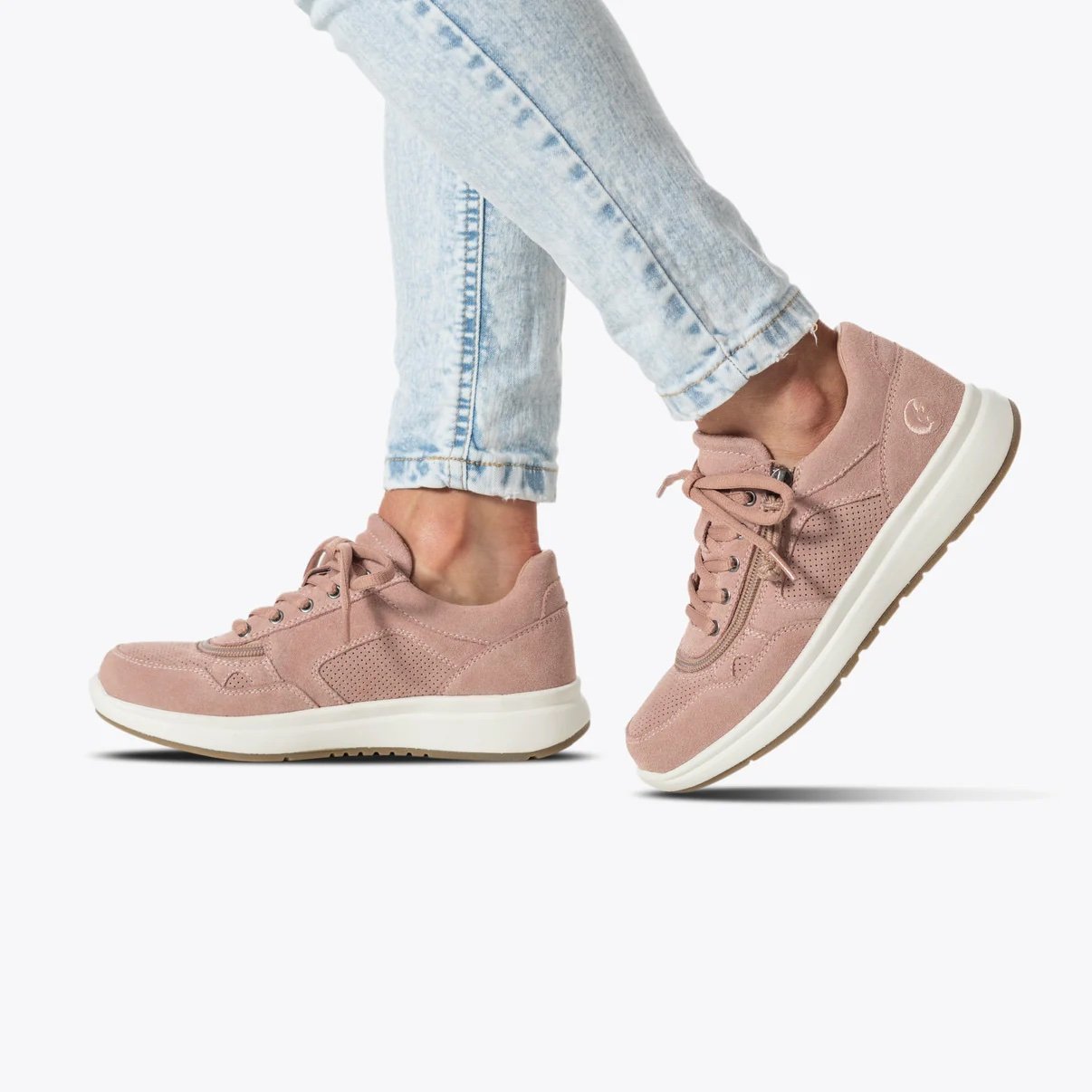 BILLY adaptive jogger shoes in blush pink with a white rubber sole shown on a woman wearing light wash jeans