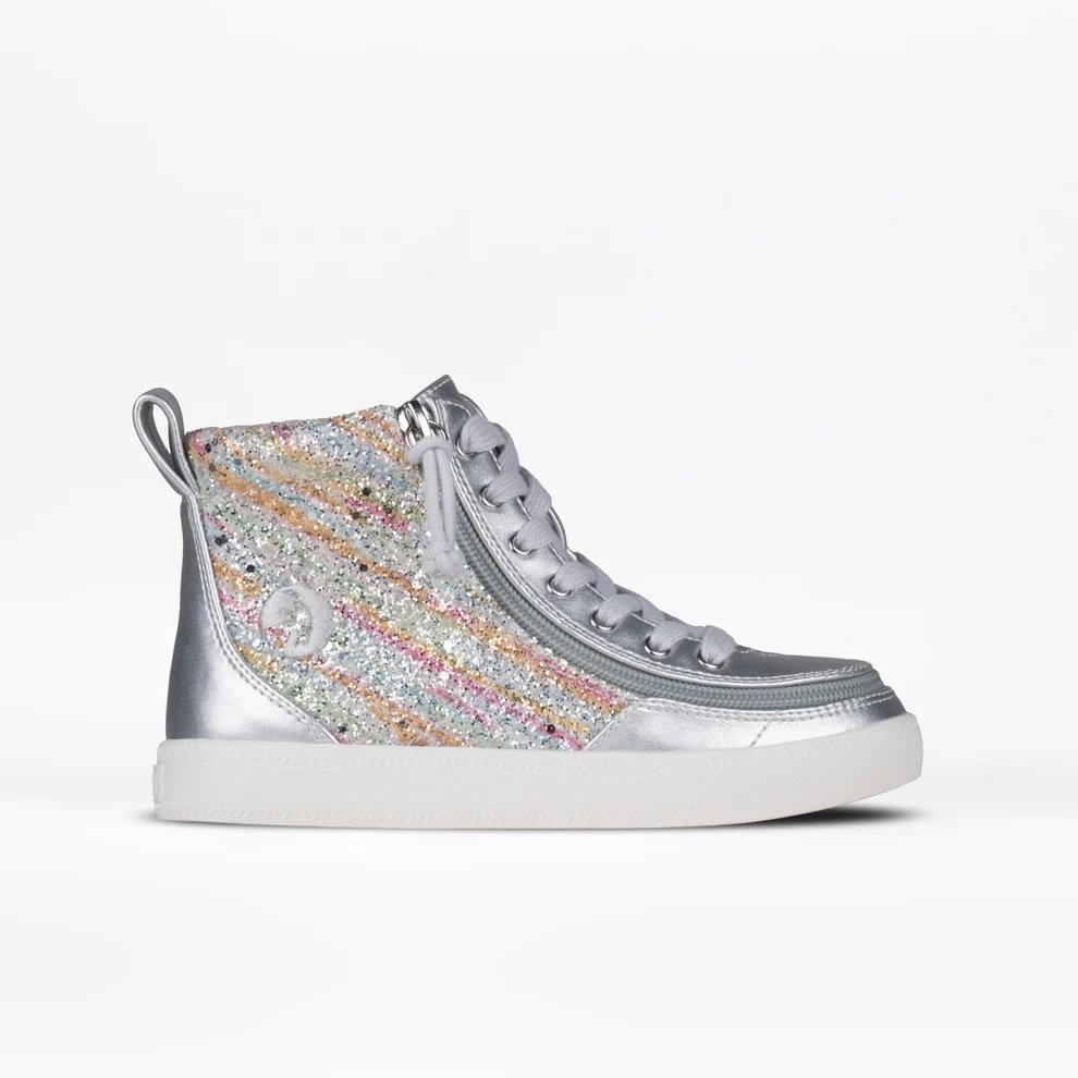 BILLY high top adaptive sneakers shown in a mettalic grey with rainbow sparkles up the center. The laces and soles are white, and the wraparound zipper is also a mettalic grey