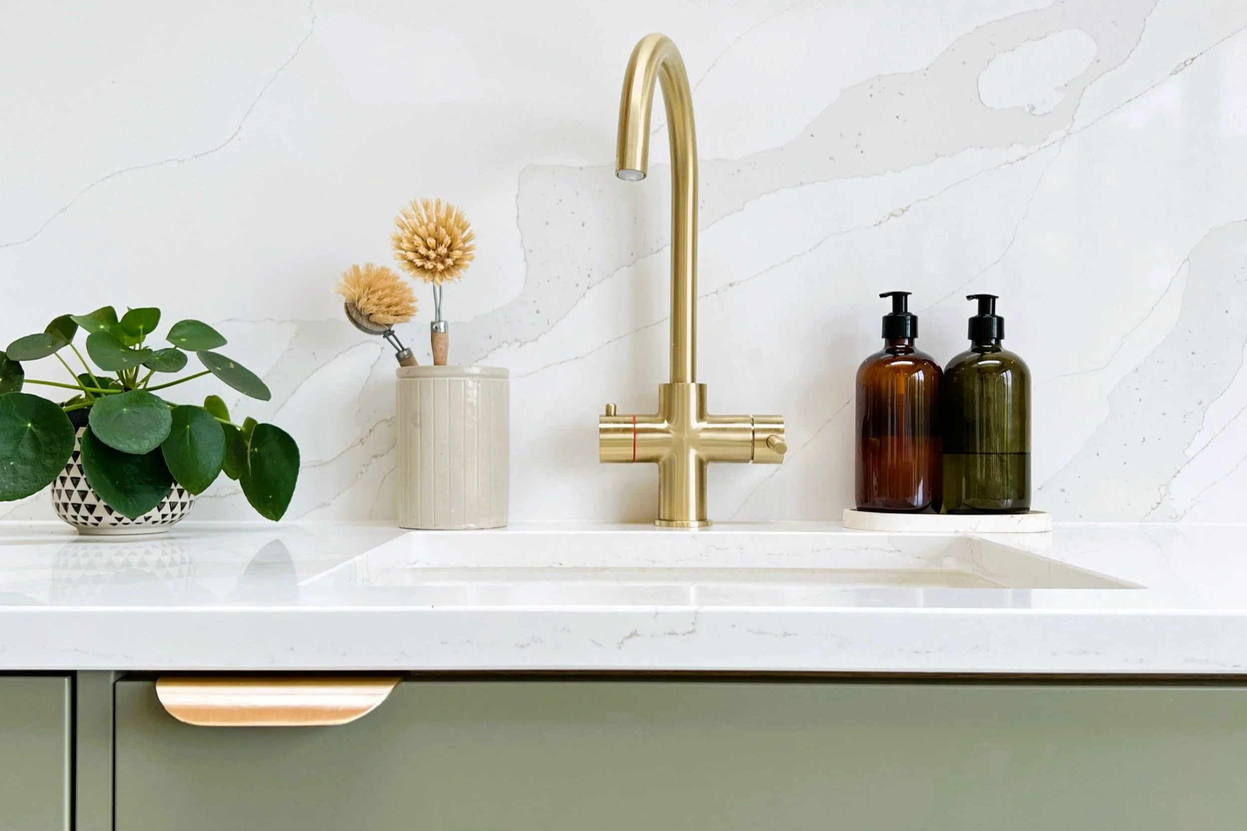 Farrow and Ball Treron kitchen cabinets with quartz worktop