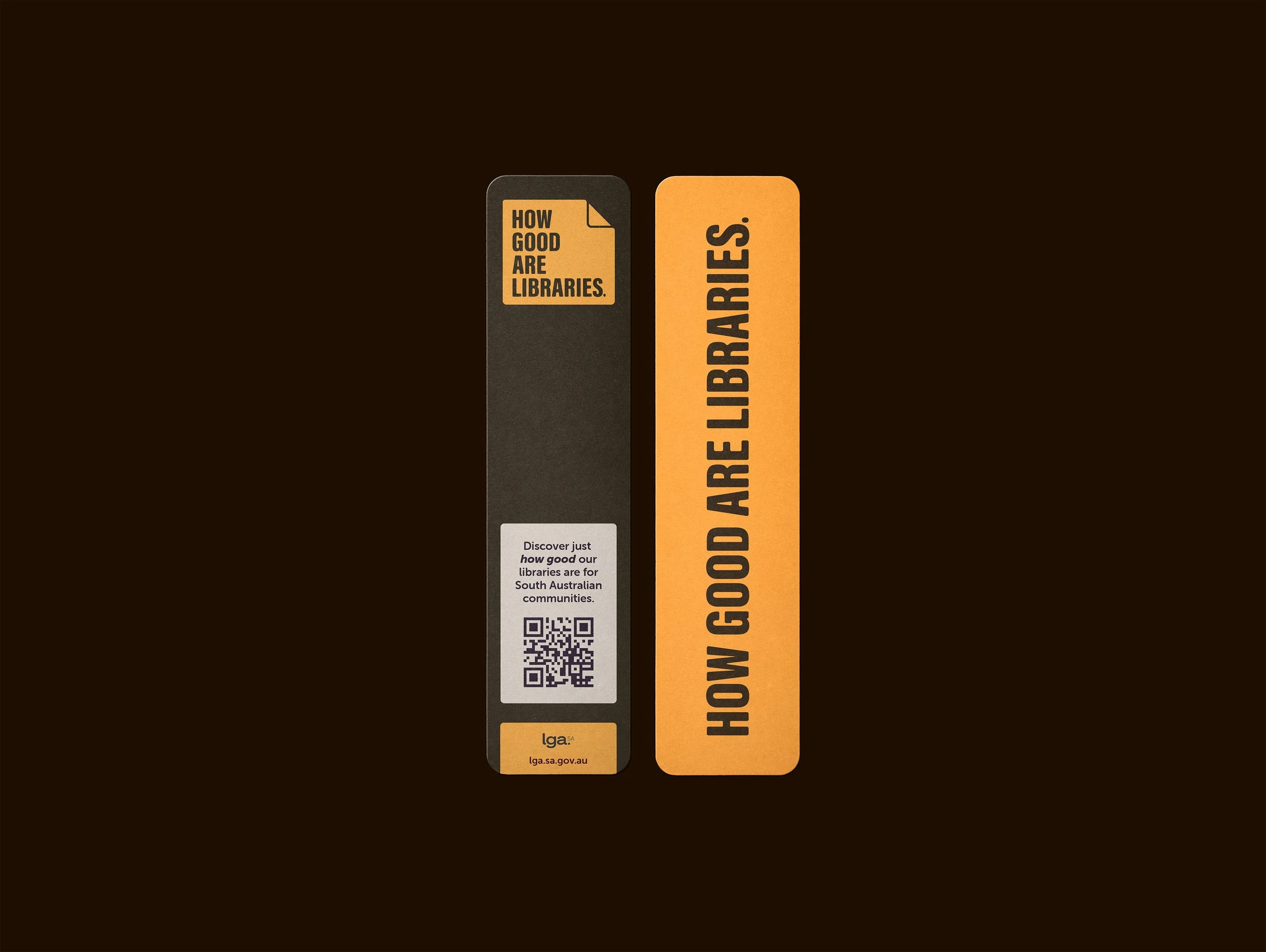 Two bookmarks; one black with orange text and a QR code, and one orange with black text that reads 'HOW GOOD ARE LIBRARIES.'.