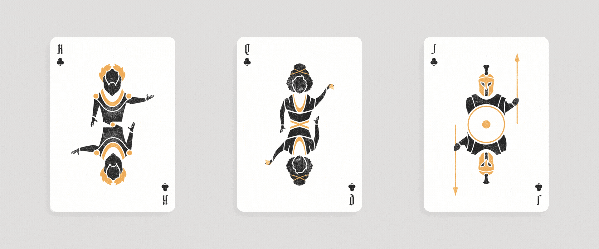 Three playing cards from a deck face up, showing the King of Clubs, Queen of Clubs, and Jack of Clubs, with a black and gold stylized design of ancient warriors on each card.
