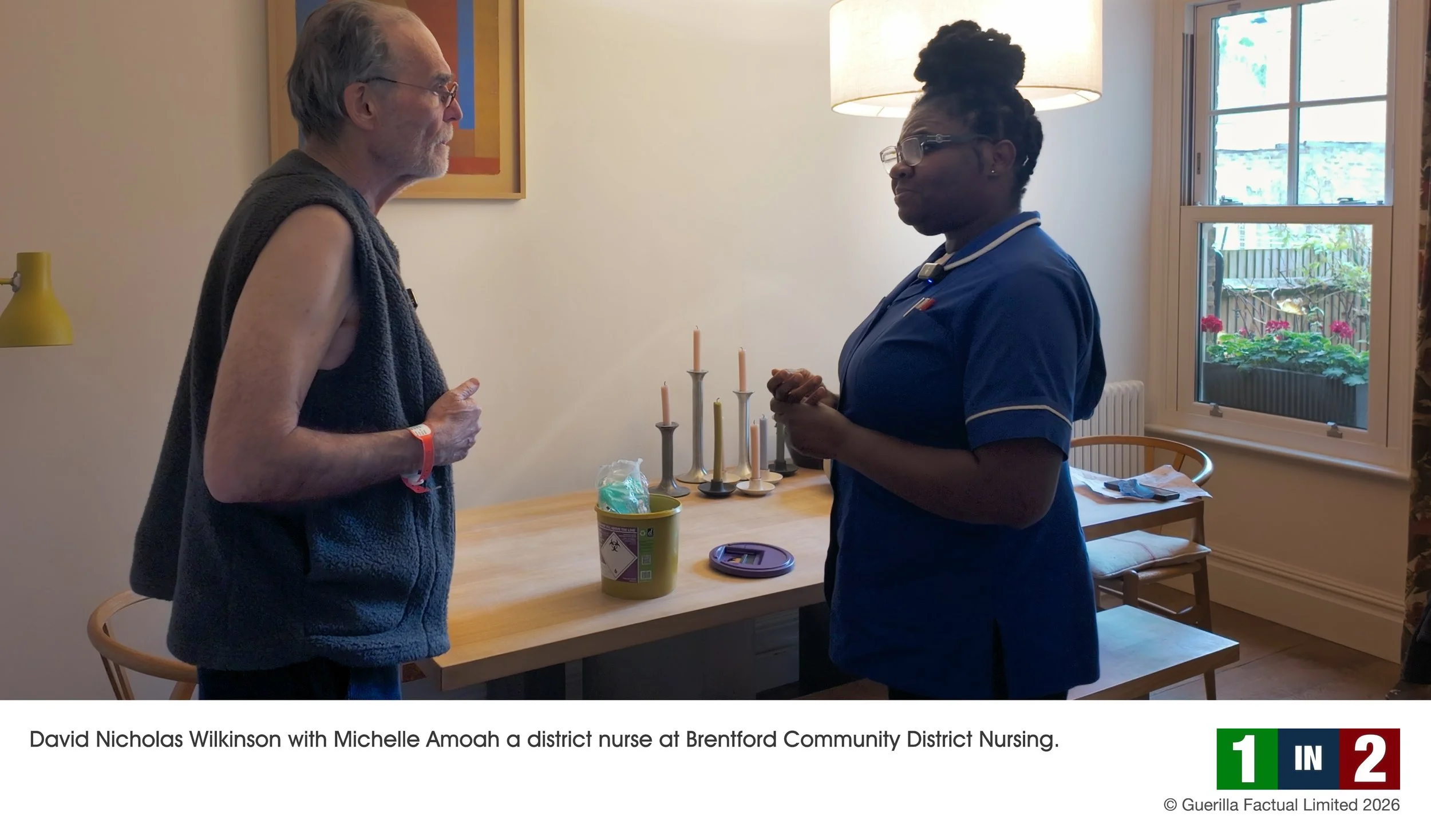David Nicholas Wilkinson with Michelle Amoah a district nurse at Brentford Community District Nursing.jpg