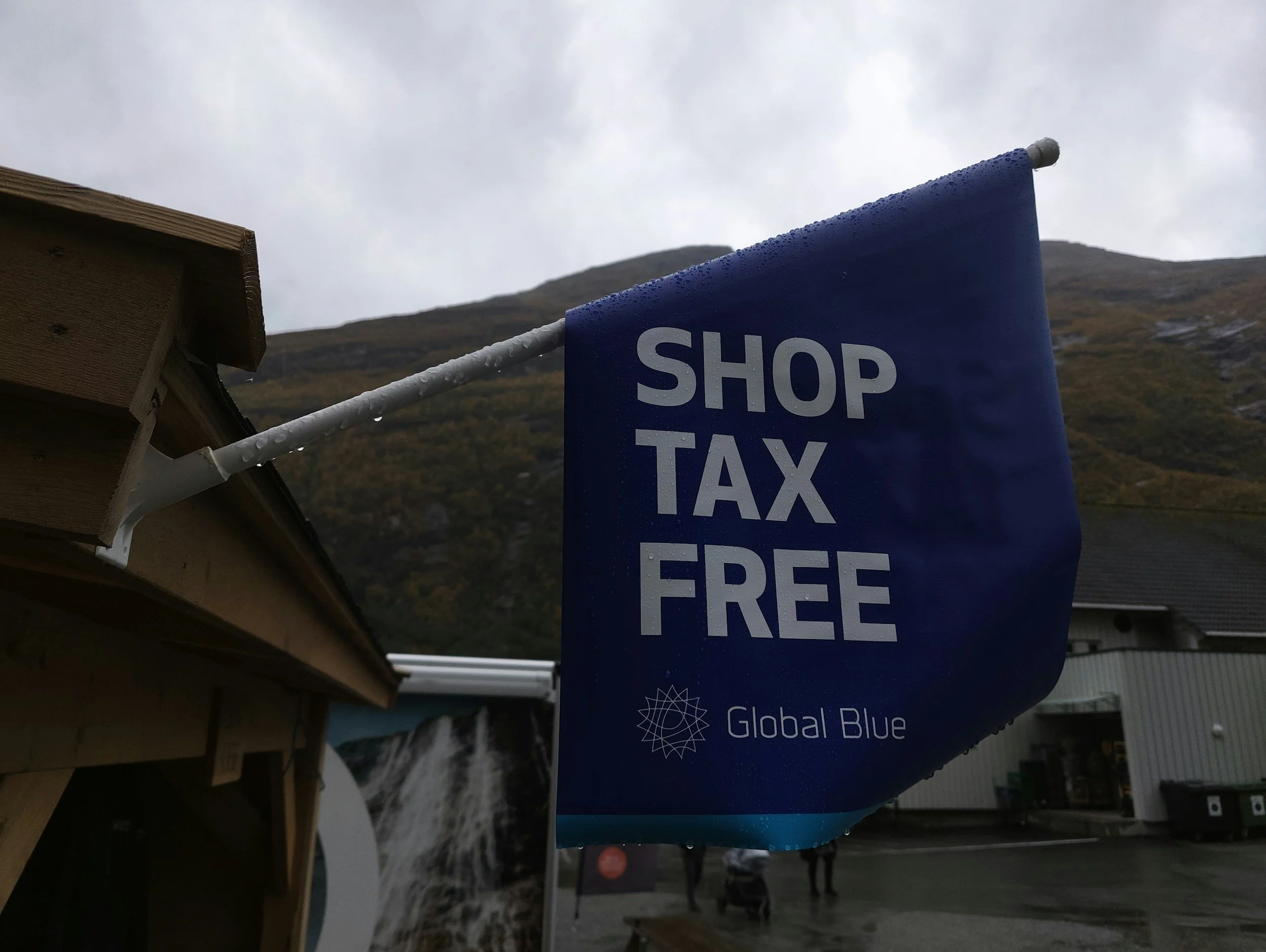 bandeira azul com escrita branca shop tax free