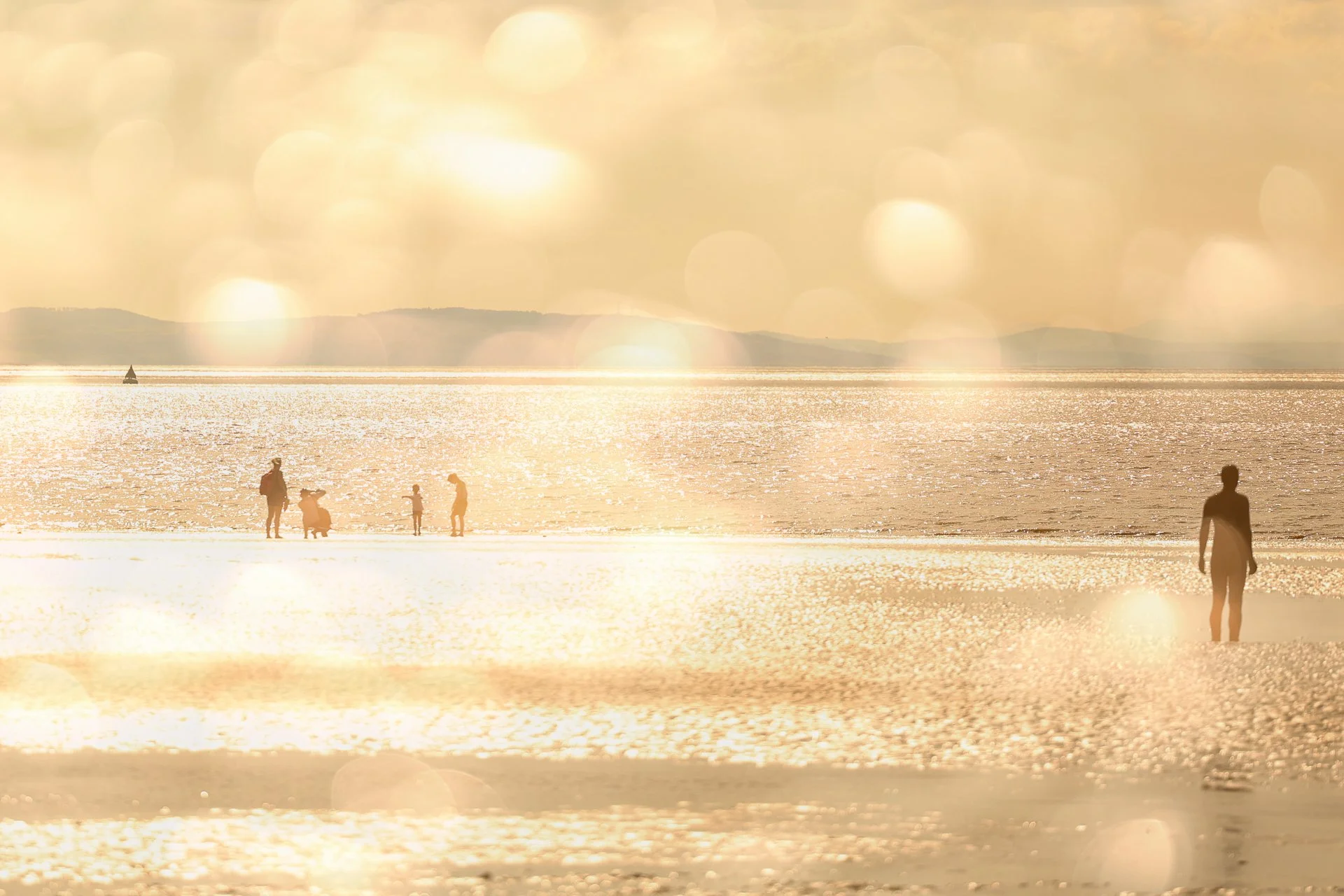 In Camera Multiple Exposure 📸

Continuing my sunny theme I love this image from Crosby beach just North of Liverpool.  It has one of the sculptures from the Anthony Gormley installation and some 'real people' in it but I love the feeling of warmth t