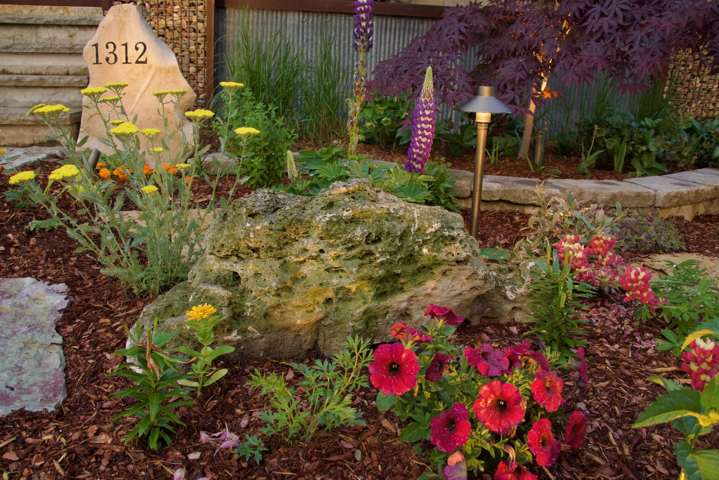 spot light on house number sign