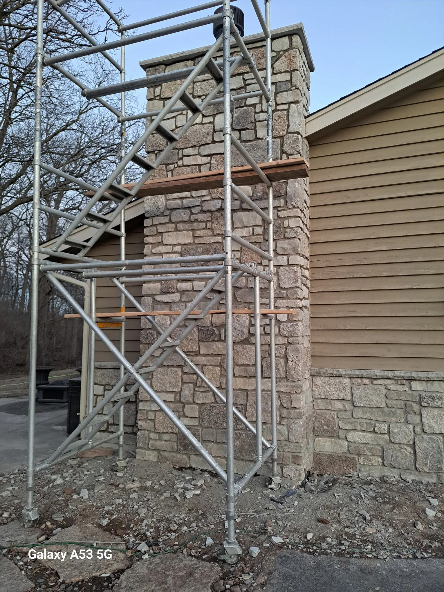 natural veneer stone on house and fireplace 