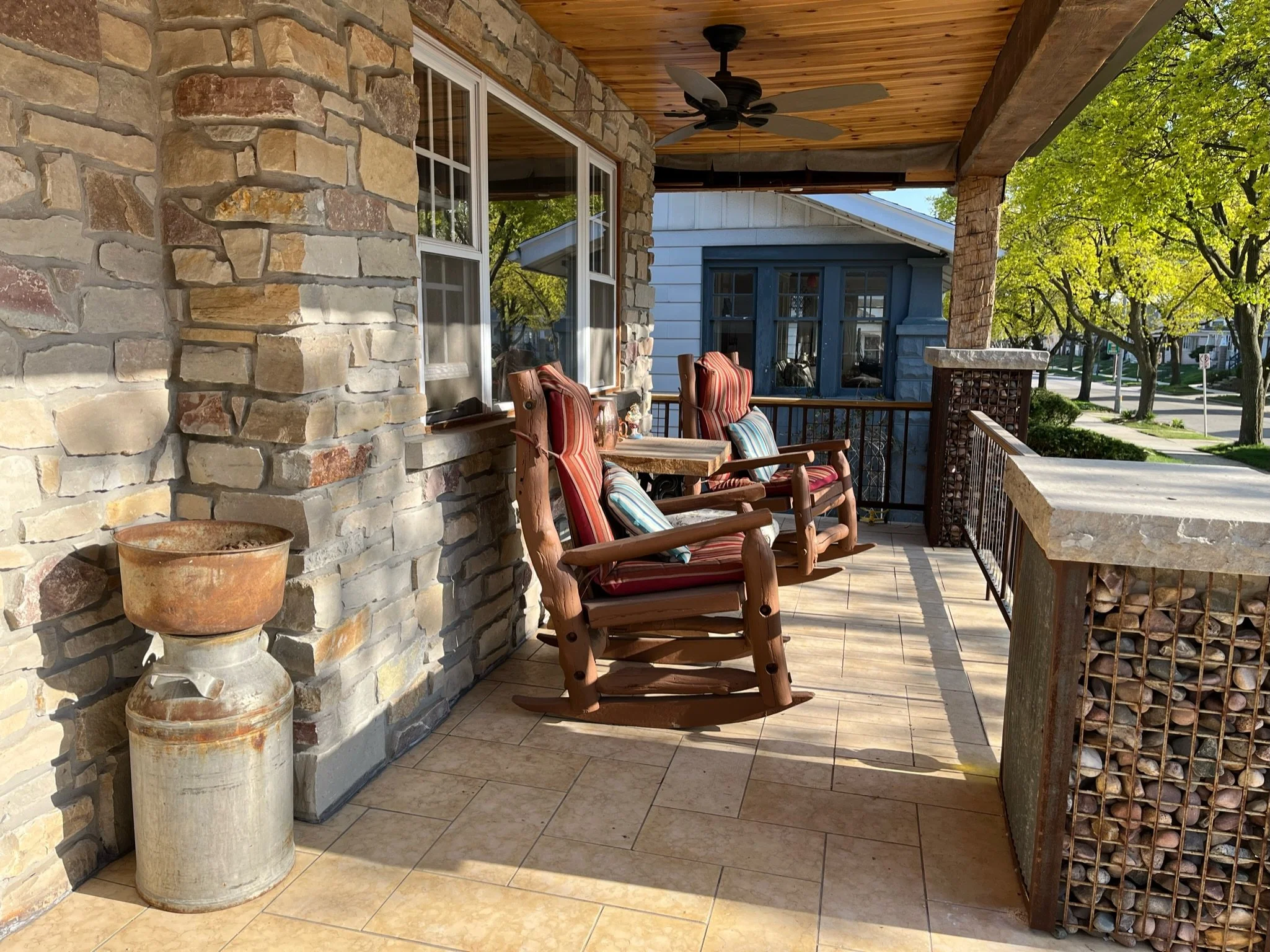 veneer stone front porch, gabion columns, stone pillar caps