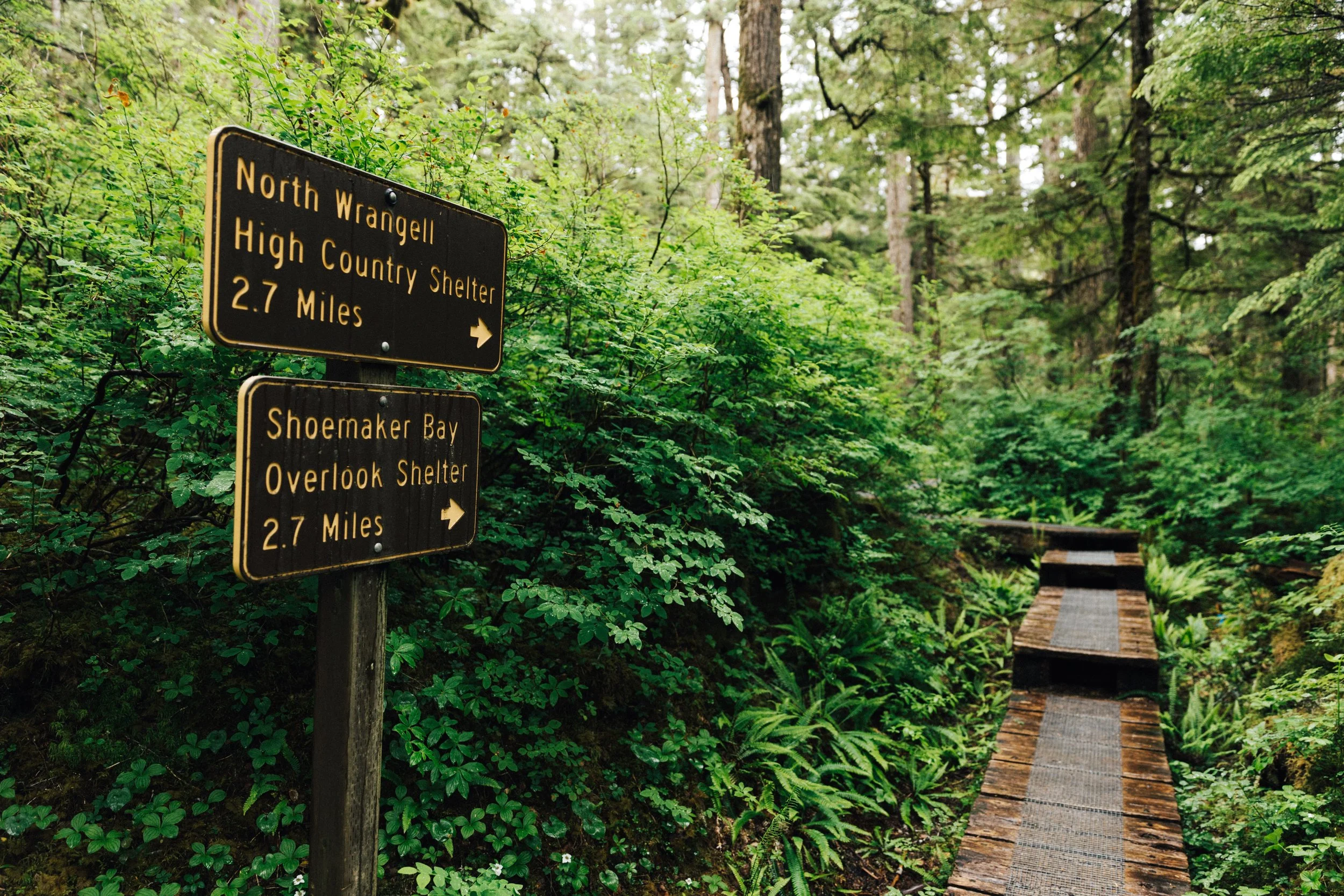 Sign Postage and trail that leads to Shoemaker Bay Overlook shelter and North Wrangell High Country Shelter.