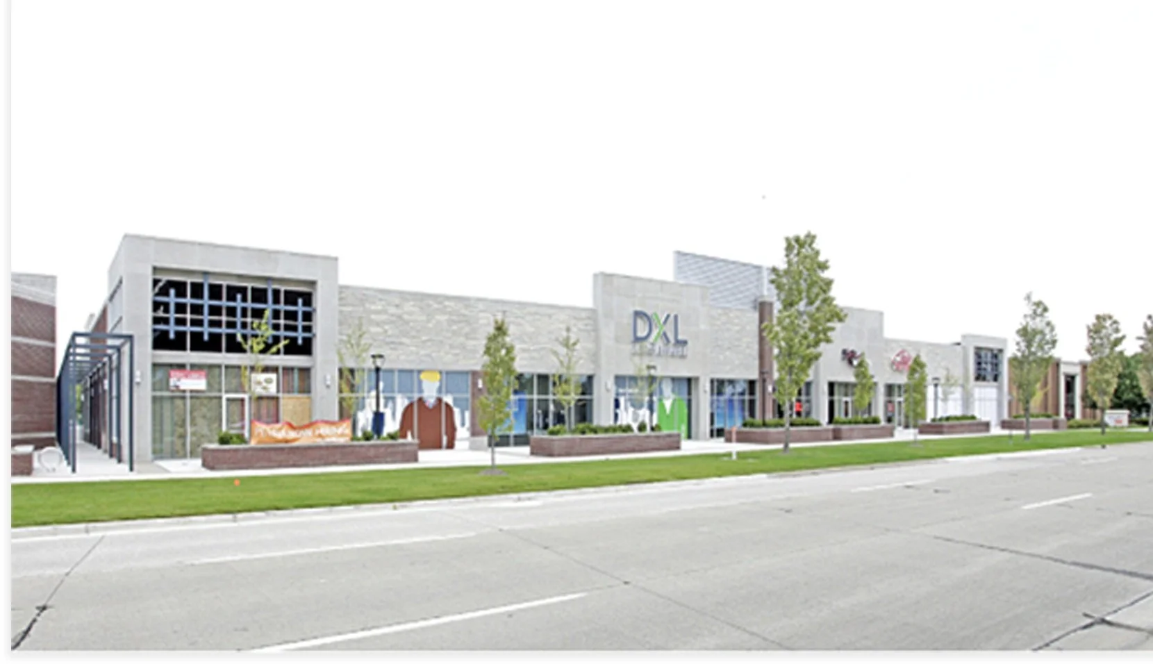 Commercial shopping center with storefronts and modern architecture
