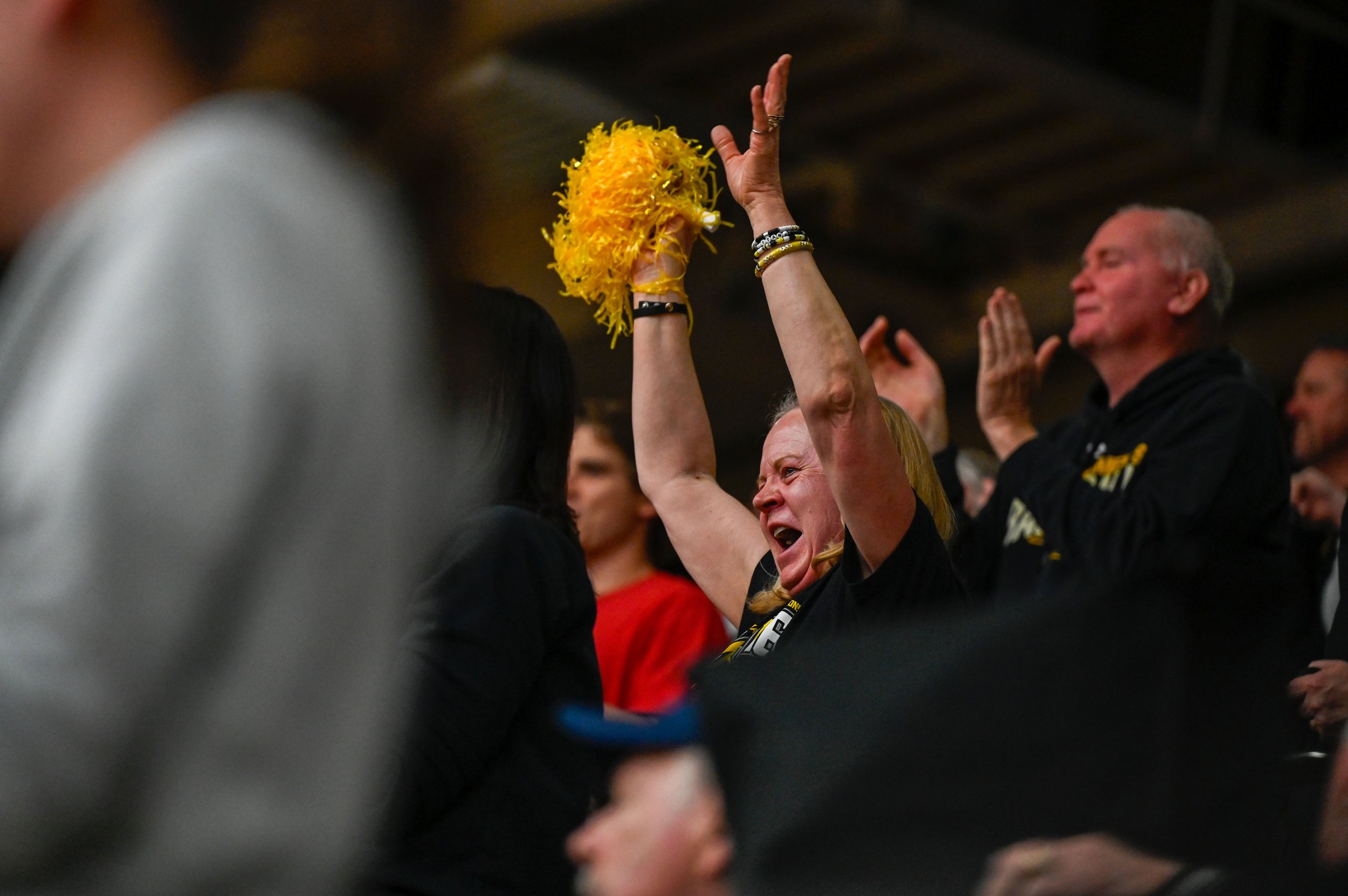 Karen Fischer celebrate as UW-Oshkosh is moments from winning a game that will earn them a place in the Sweet 16 of the 2025 NCAA Division III tournament at Kolf Sports Center in Oshkosh, Wisconsin on March 8, 2025. Karen was there to support her son