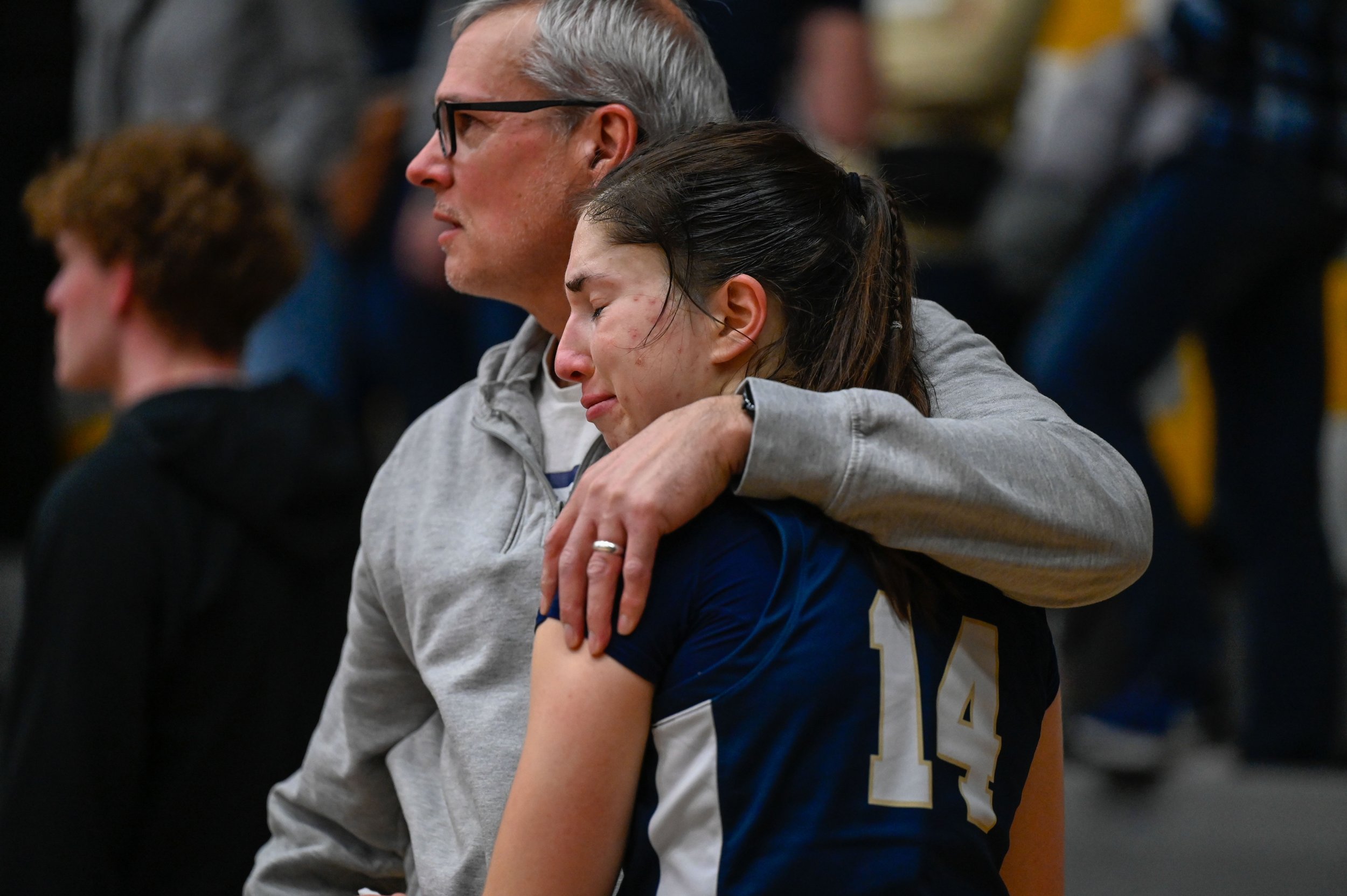 Anna Garfield, a guard for Bethel University's women's basketball team, cries after a loss to UW-Oshkosh at Kolf Sports Center on March 8, 2025. The loss meant the end for Bethel's women's basketball team, and a spot in the Sweet 16 of the 2025 NCAA