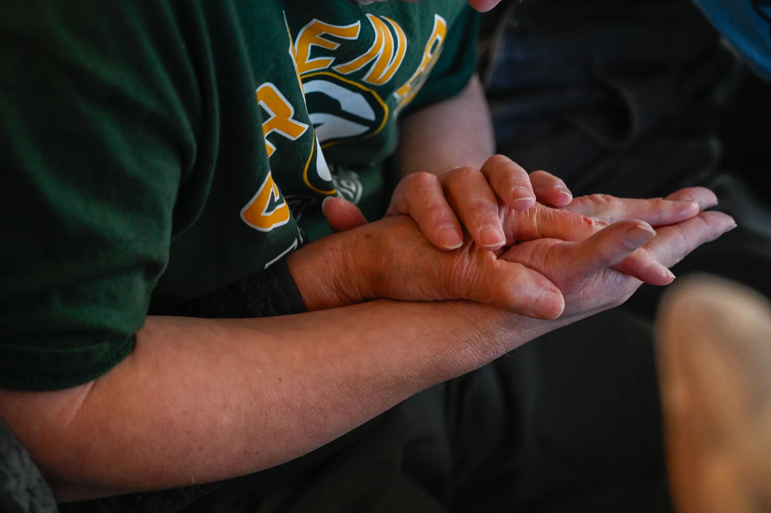 Chad grabs Janet’s hand to squeeze it, a gesture he does frequently with a smile on his face. 