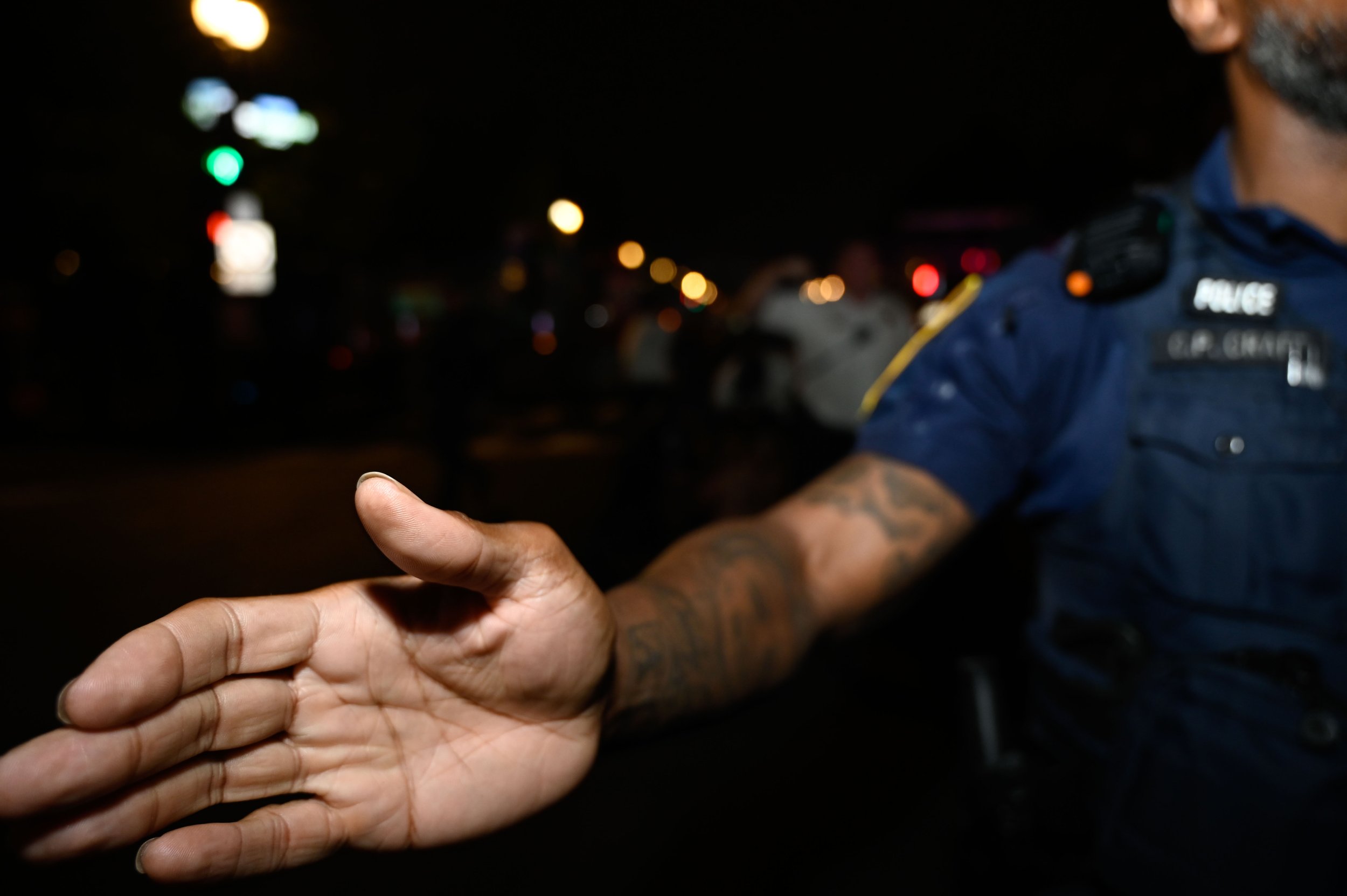 Police form a line and move protesters and members of the press out of the street after tensions rise between protesters and attendees leaving the Army's 250th birthday celebration on Washington, D.C., on June 14, 2025.