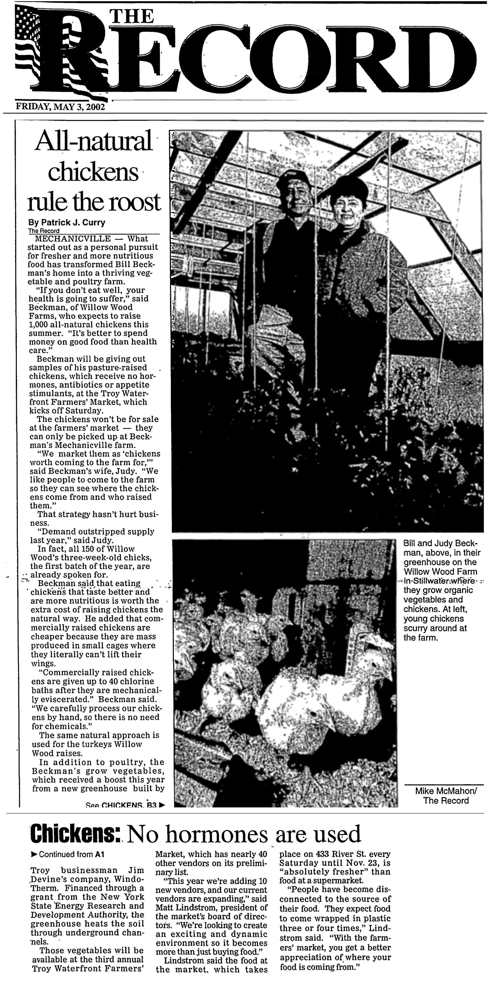 The Record front-page clipping, May 3, 2002, pages A1 and A3: "All-natural chickens rule the roost" by Patrick J. Curry, about Willow Wood Farms and the opening of the third Troy Waterfront Farmers' Market season.