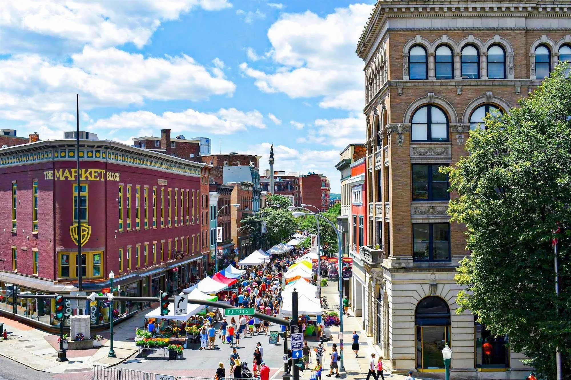 Shoppers at the outdoor Troy Waterfront Farmers Market, Fulton & River Street entrance, Troy, NY. Photo by Maria Fane.