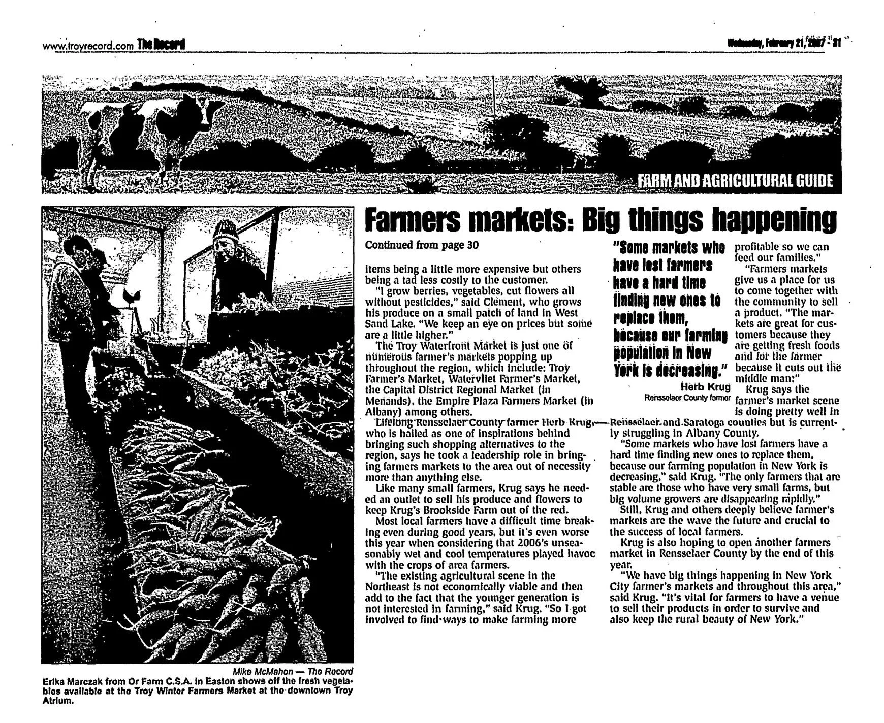 The Record, February 21, 2007, page 31: continuation, “Farmers markets: Big things happening,” with a photo of Erika Marczak of Or Farm C.S.A. at the Troy Winter Farmers Market in the Troy Atrium.