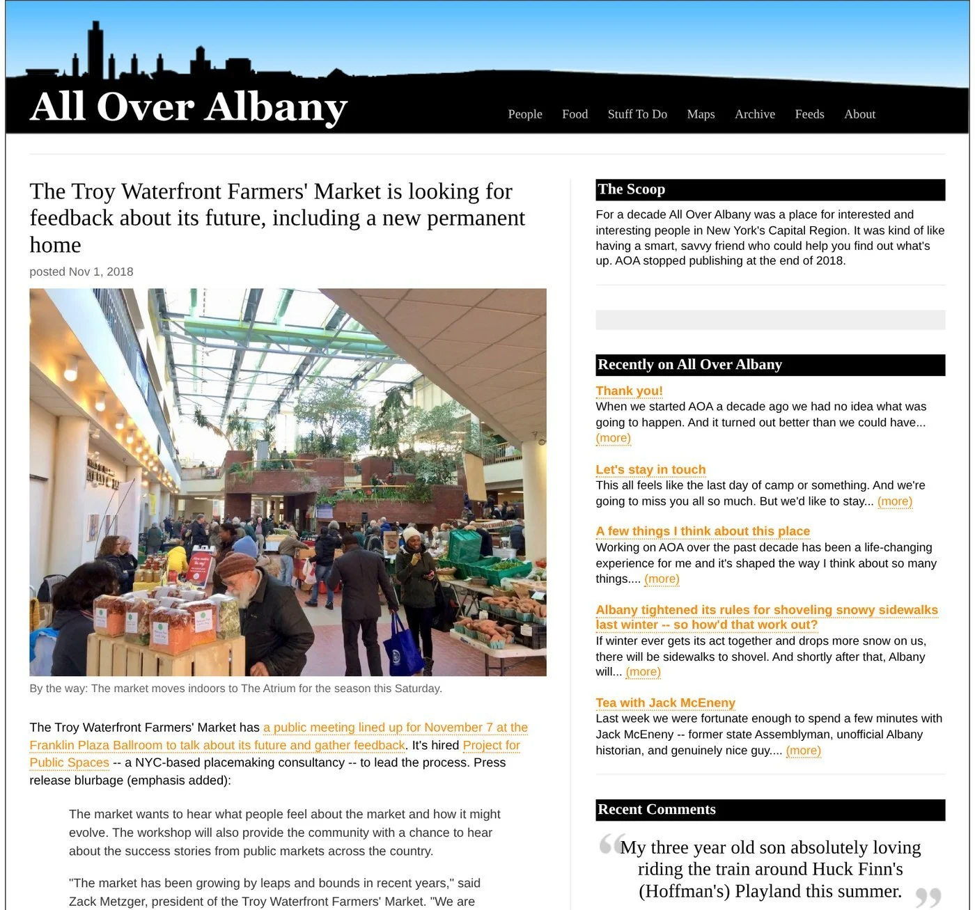 All Over Albany website, Nov. 1, 2018: ‘The Troy Waterfront Farmers’ Market is looking for feedback about its future’, with a photo of the market in the Troy Atrium