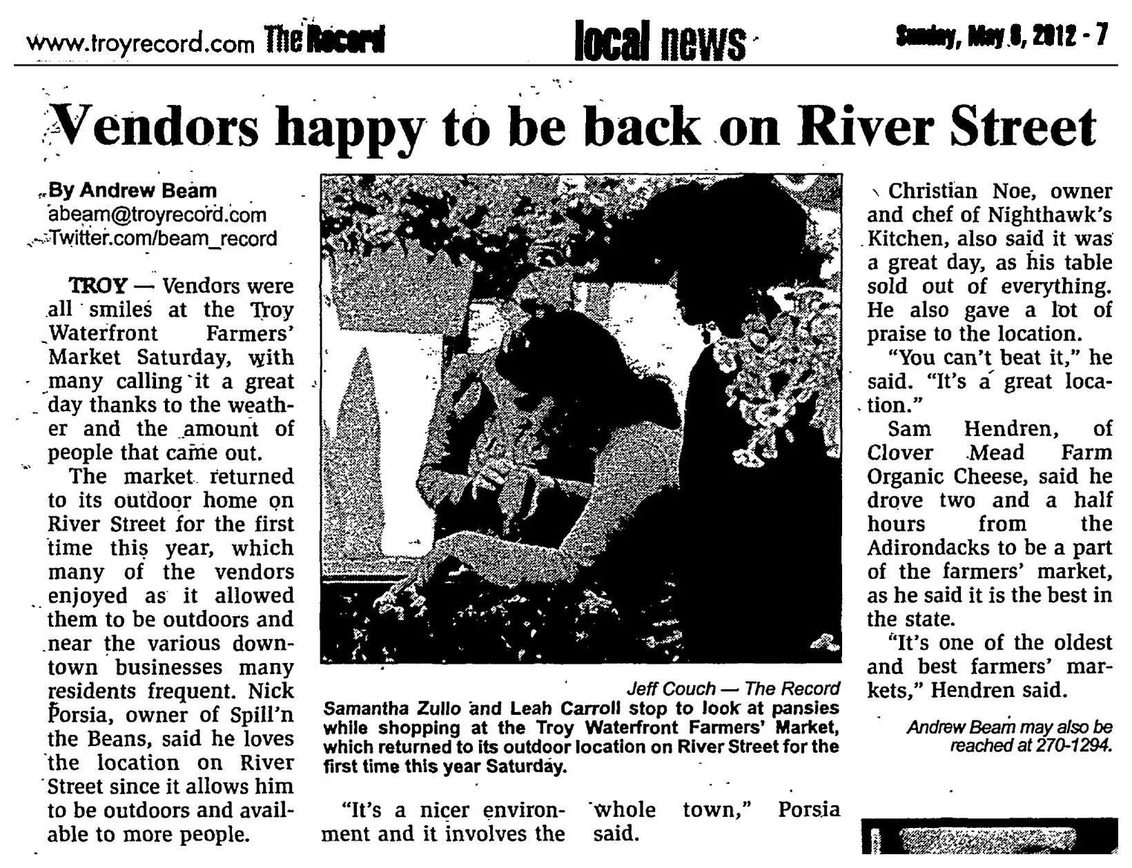 The Record, Sunday, May 6, 2012, local news page 7: “Vendors happy to be back on River Street” by Andrew Beam, with a Jeff Couch photo of Samantha Zullo and Leah Carroll looking at pansies.
