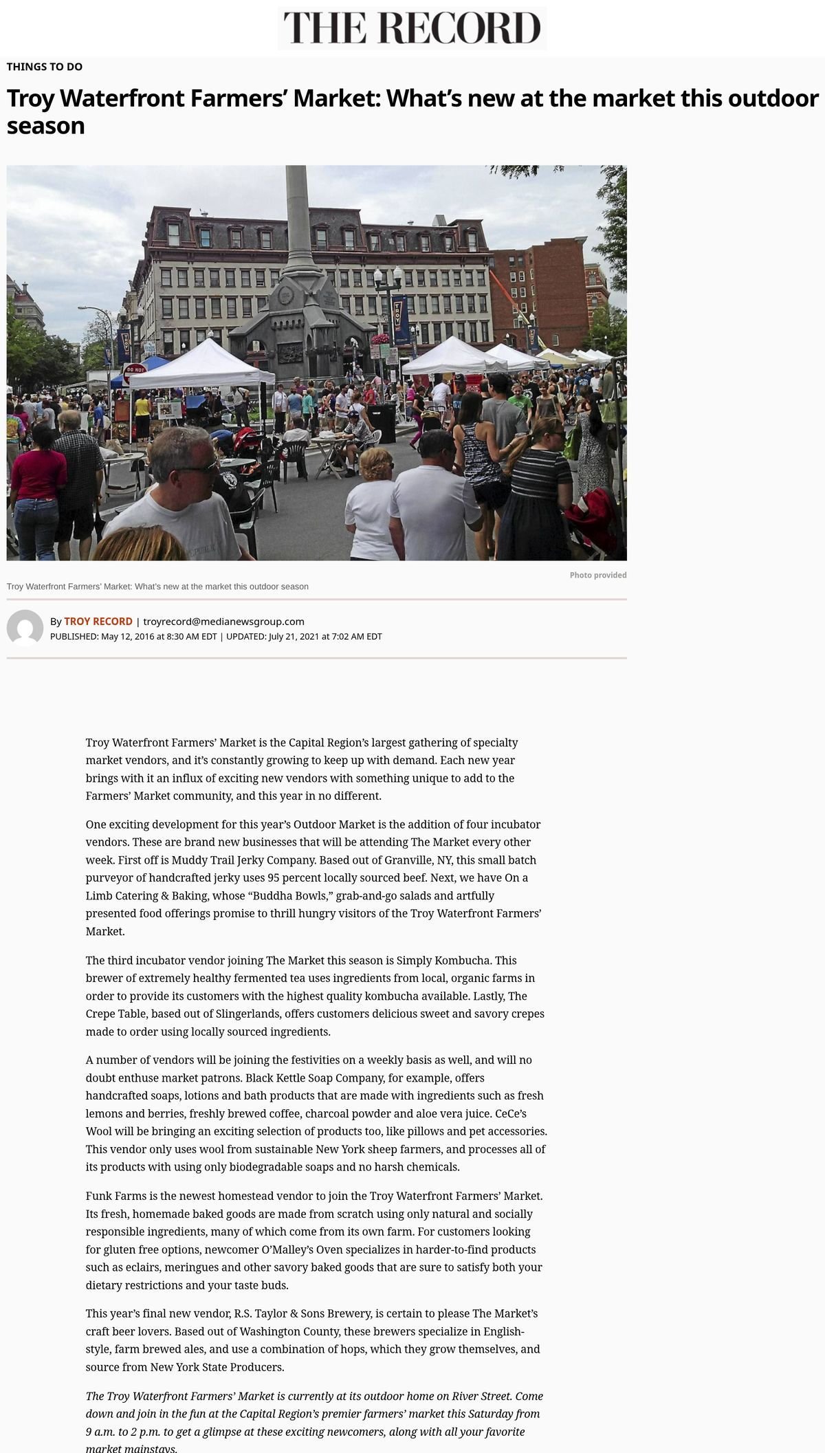The Record website, May 12, 2016: 'Troy Waterfront Farmers' Market: What's new at the market this outdoor season,' with a photo of crowds and tents around the Monument Square monument, introducing the season's new vendors.