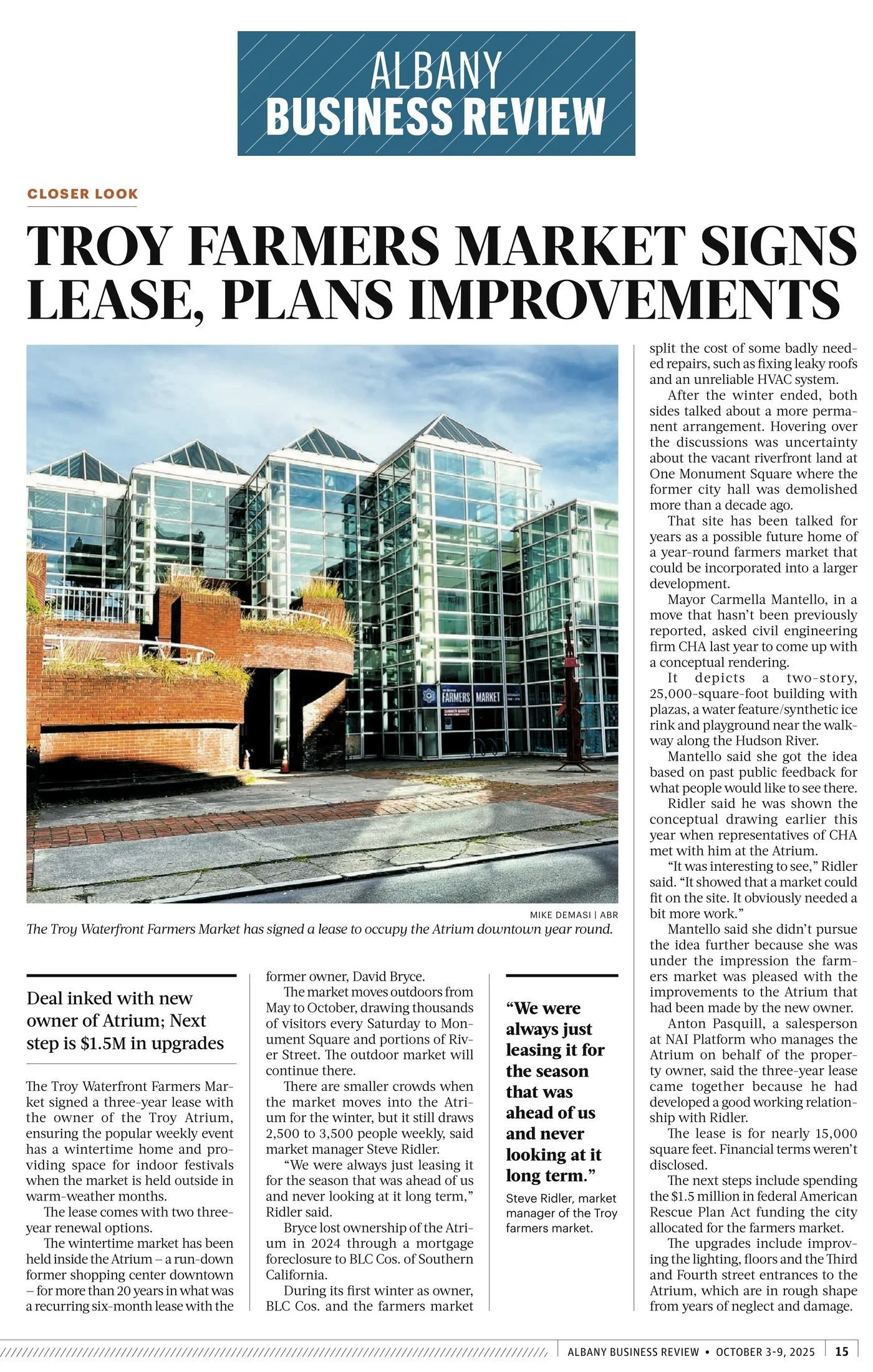 Albany Business Review, Oct. 3–9, 2025, page 15: 'Troy Farmers Market Signs Lease, Plans Improvements' by Mike DeMasi, with a photo of the glass-fronted Troy Atrium and its Farmers Market sign.